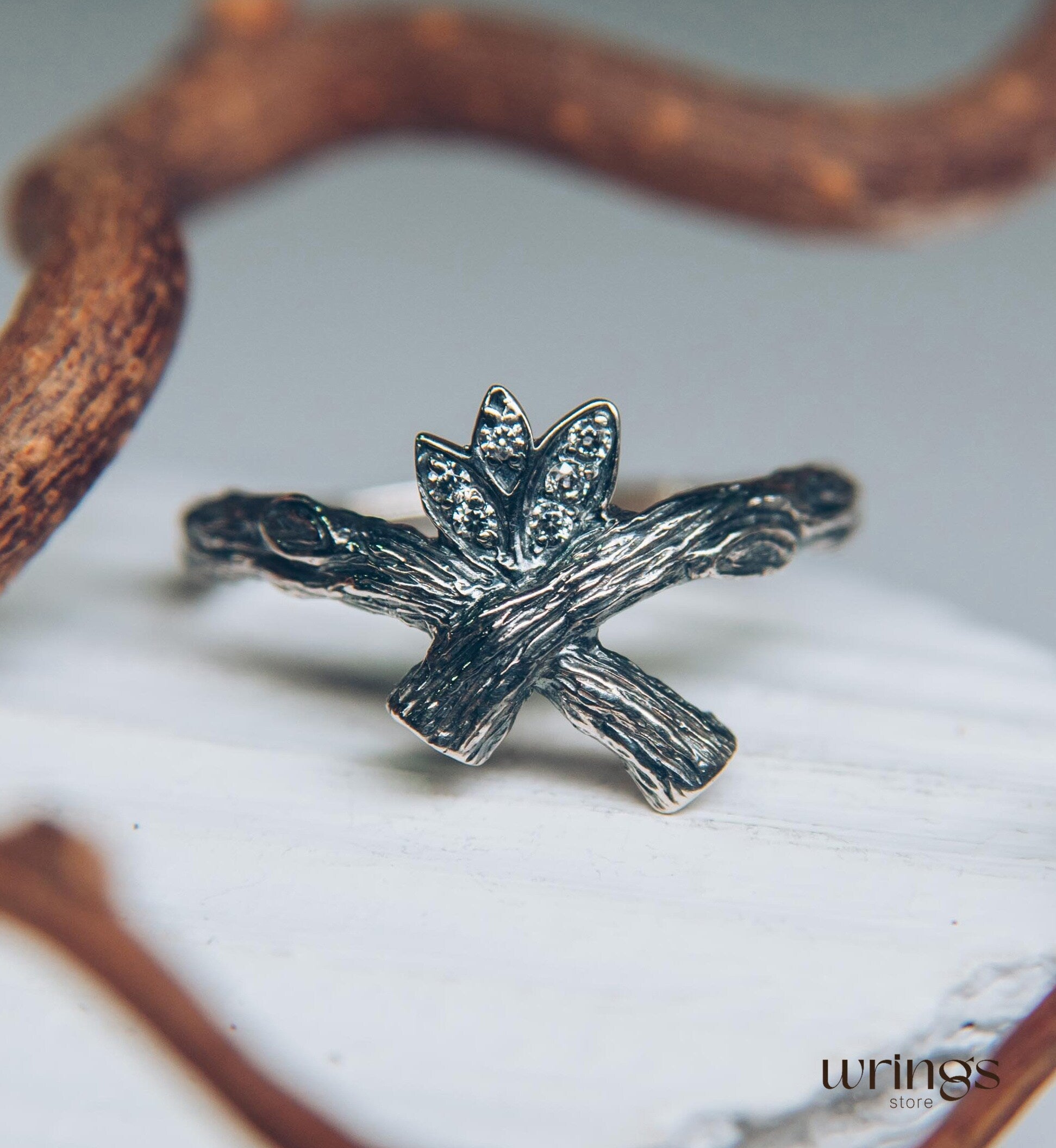 Crossed Silver Twig Ring with CZ in Leaves