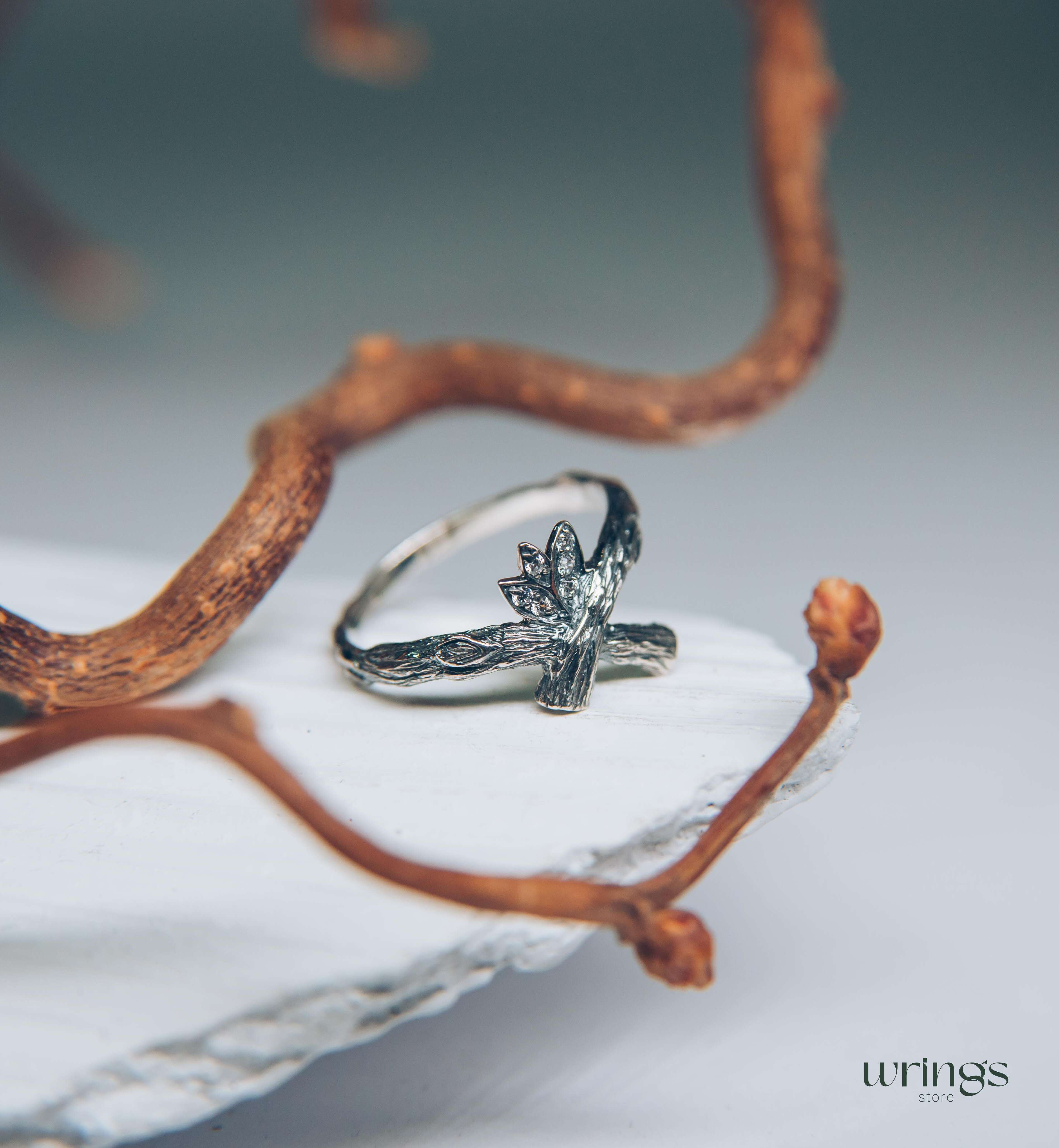 Crossed Silver Twig Ring with CZ in Leaves
