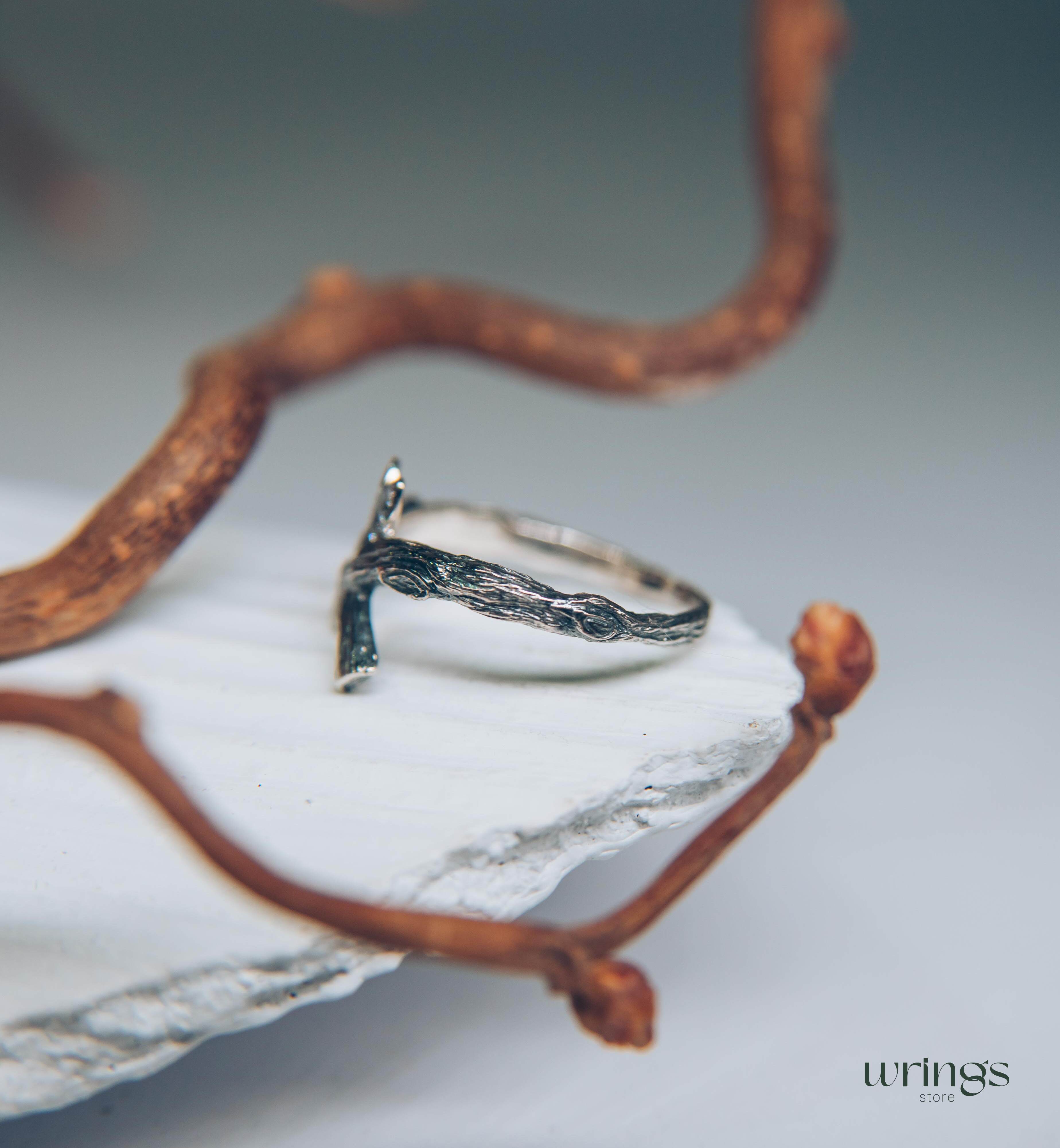 Crossed Silver Twig Ring with CZ in Leaves