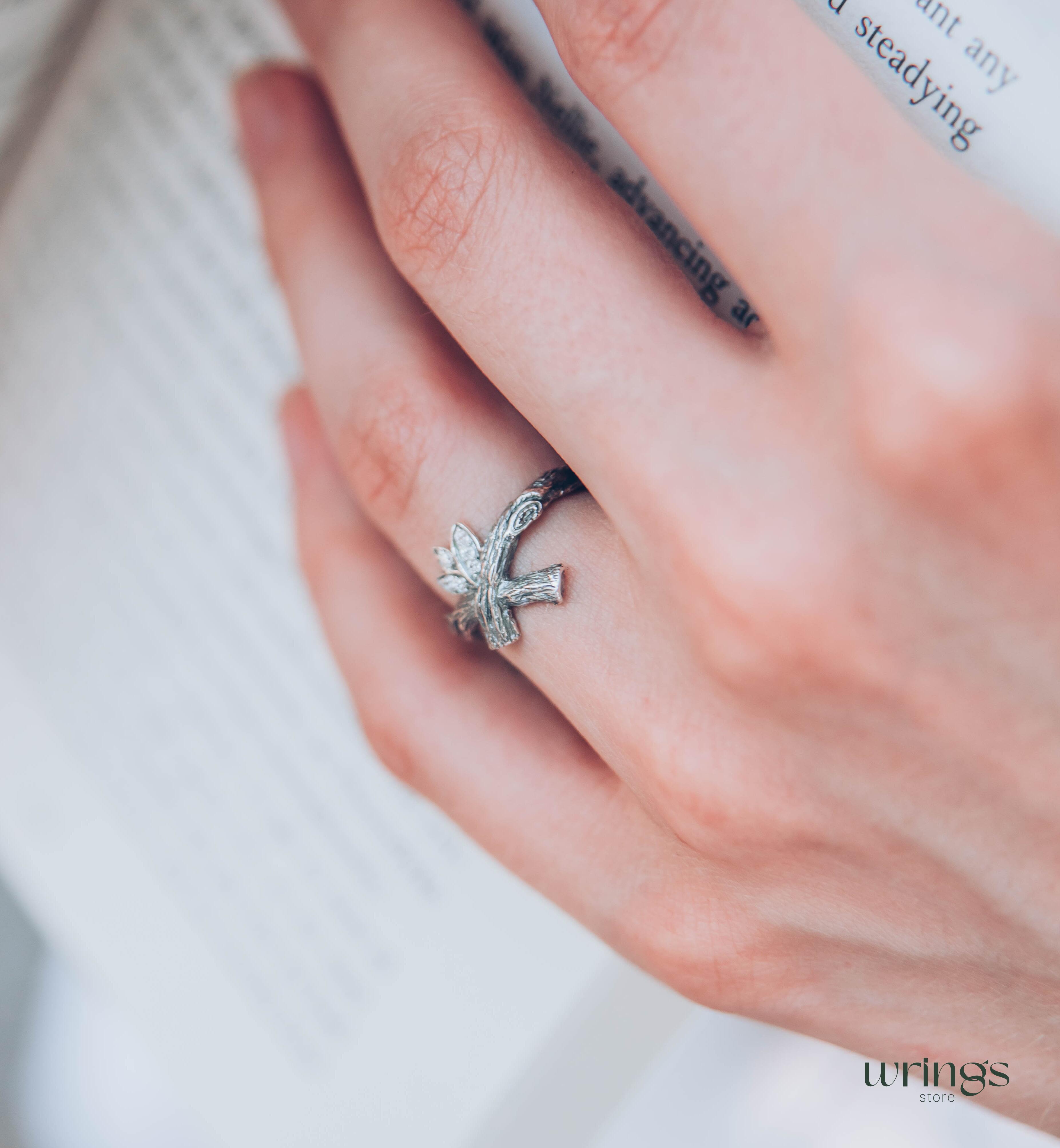 Crossed Silver Twig Ring with CZ in Leaves