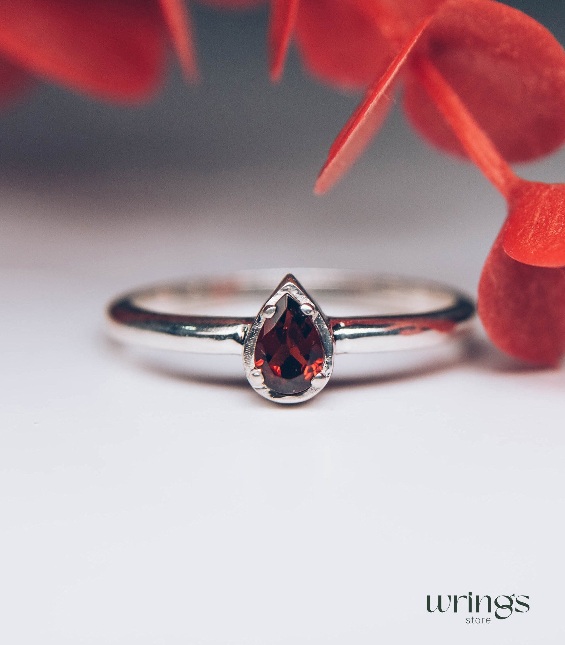 Pear cut Garnet Minimalist Silver Solitaire Ring