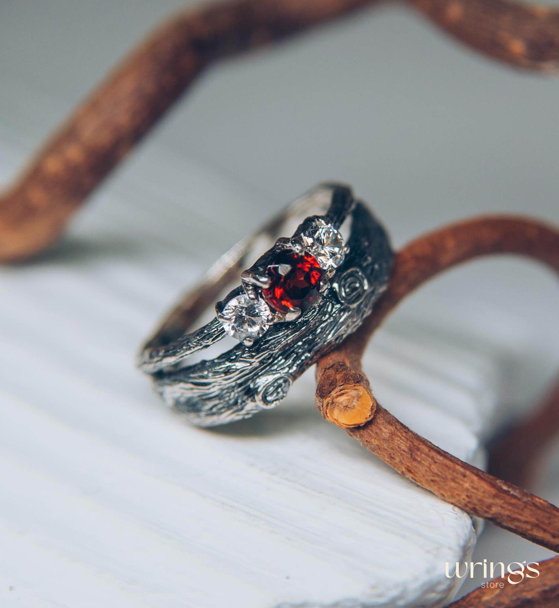 Silver Branch Engagement Ring with Garnet and Side stones