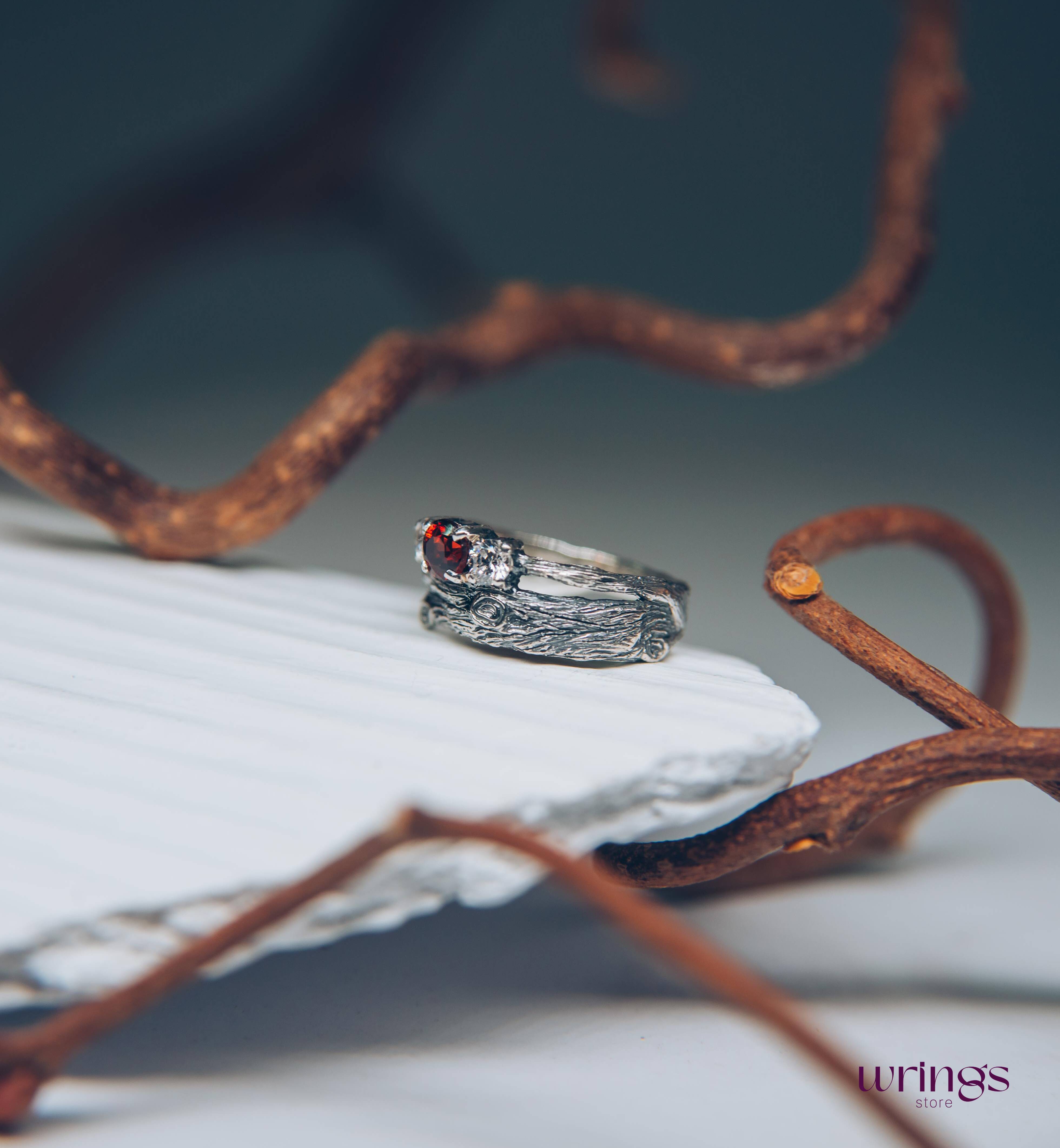 Silver Branch Engagement Ring with Garnet and Side stones