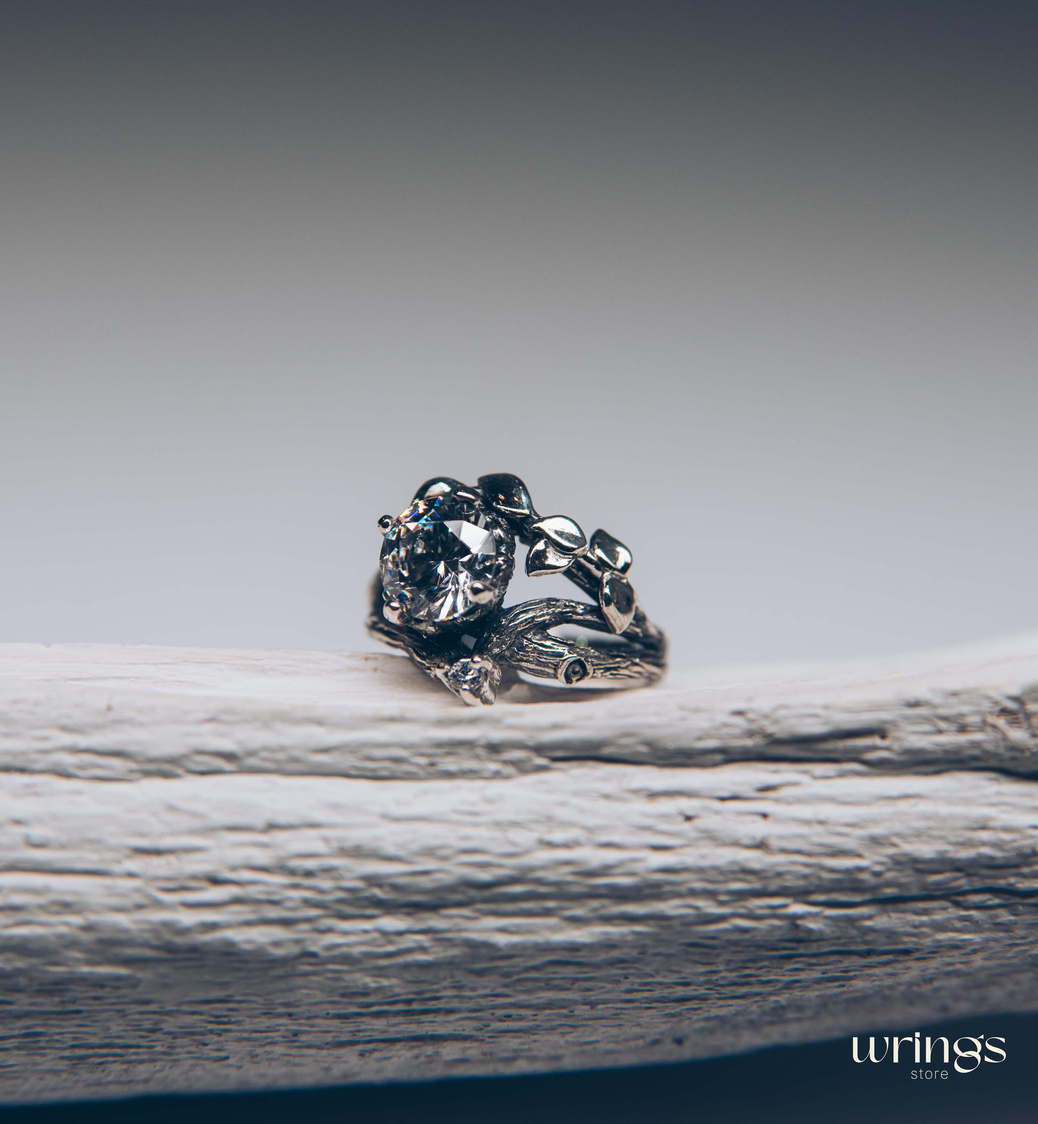 Silver Branch Engagement Ring with Large Gemstone and Leaves