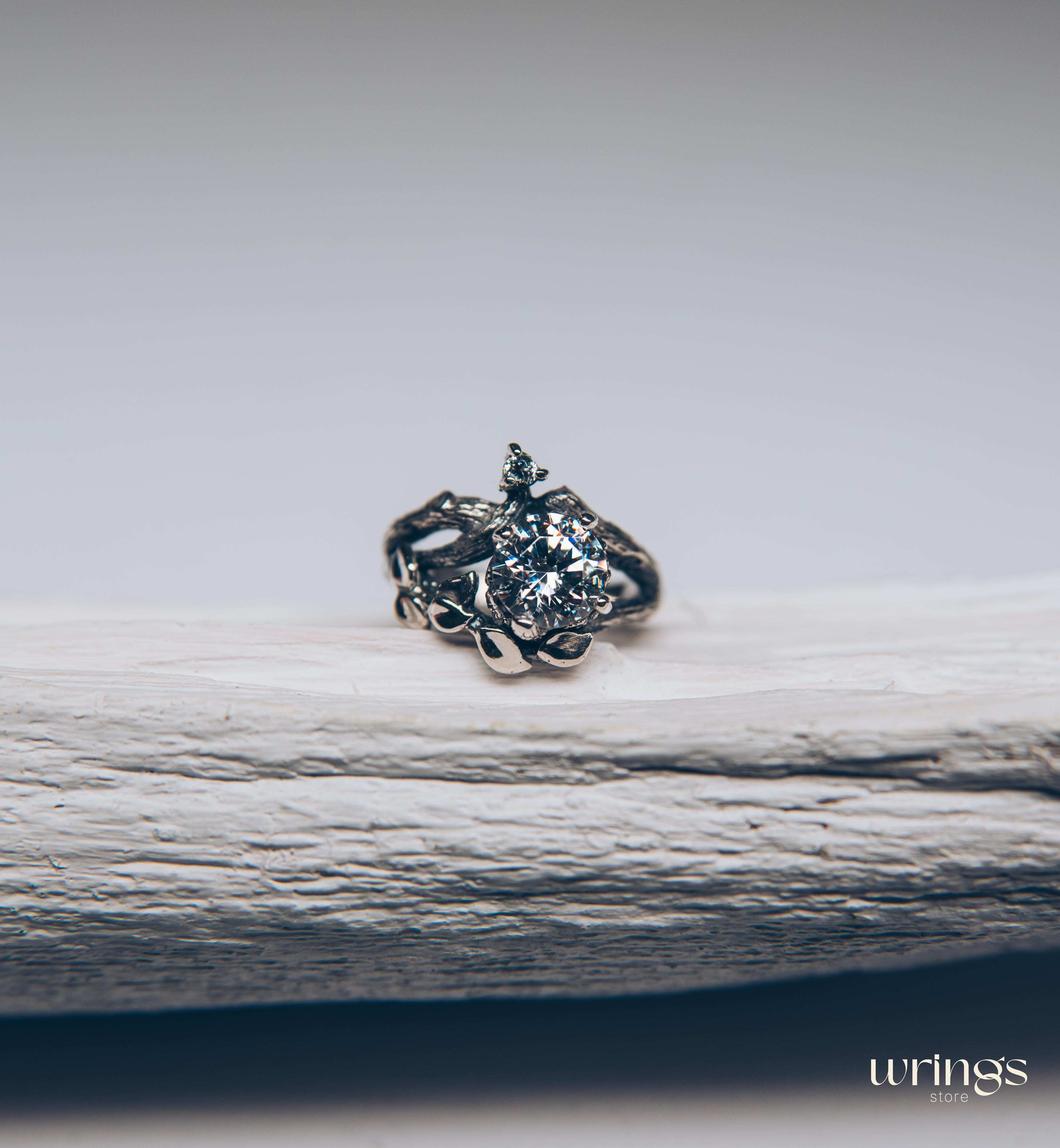 Silver Branch Engagement Ring with Large Gemstone and Leaves