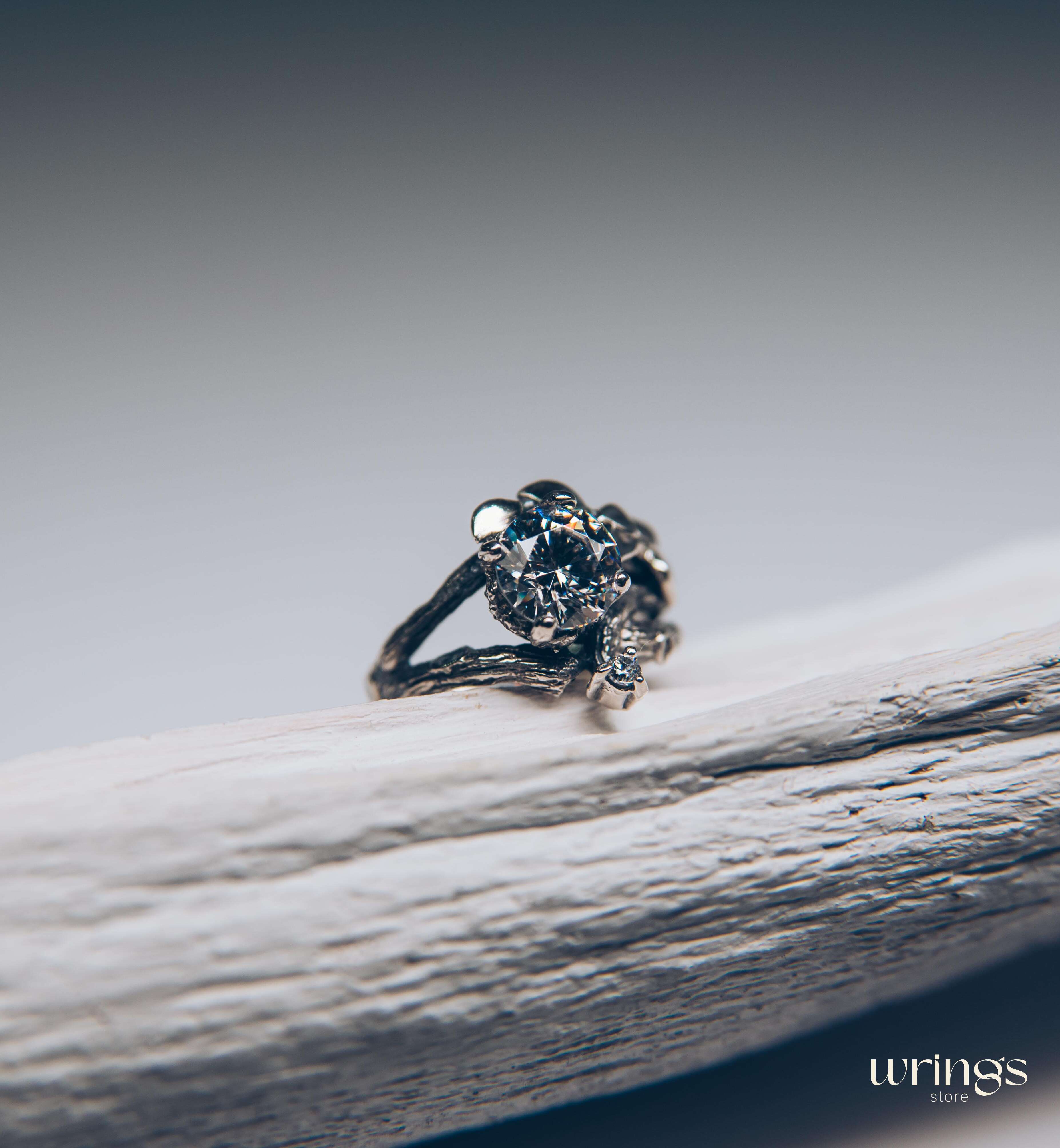 Silver Branch Engagement Ring with Large Gemstone and Leaves