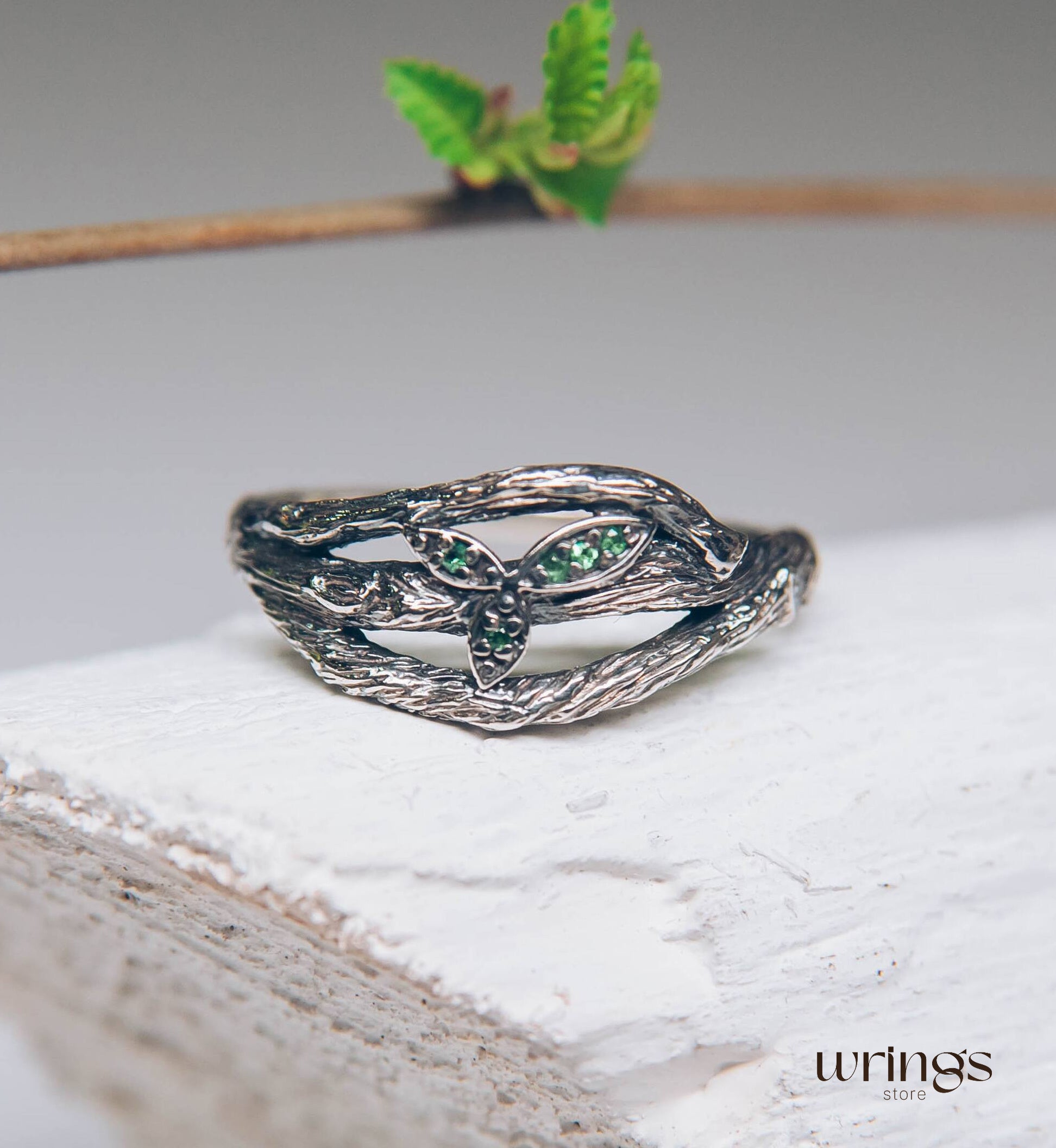 Subtle Silver Twisted Branch Unique Emerald Ring with Leaves