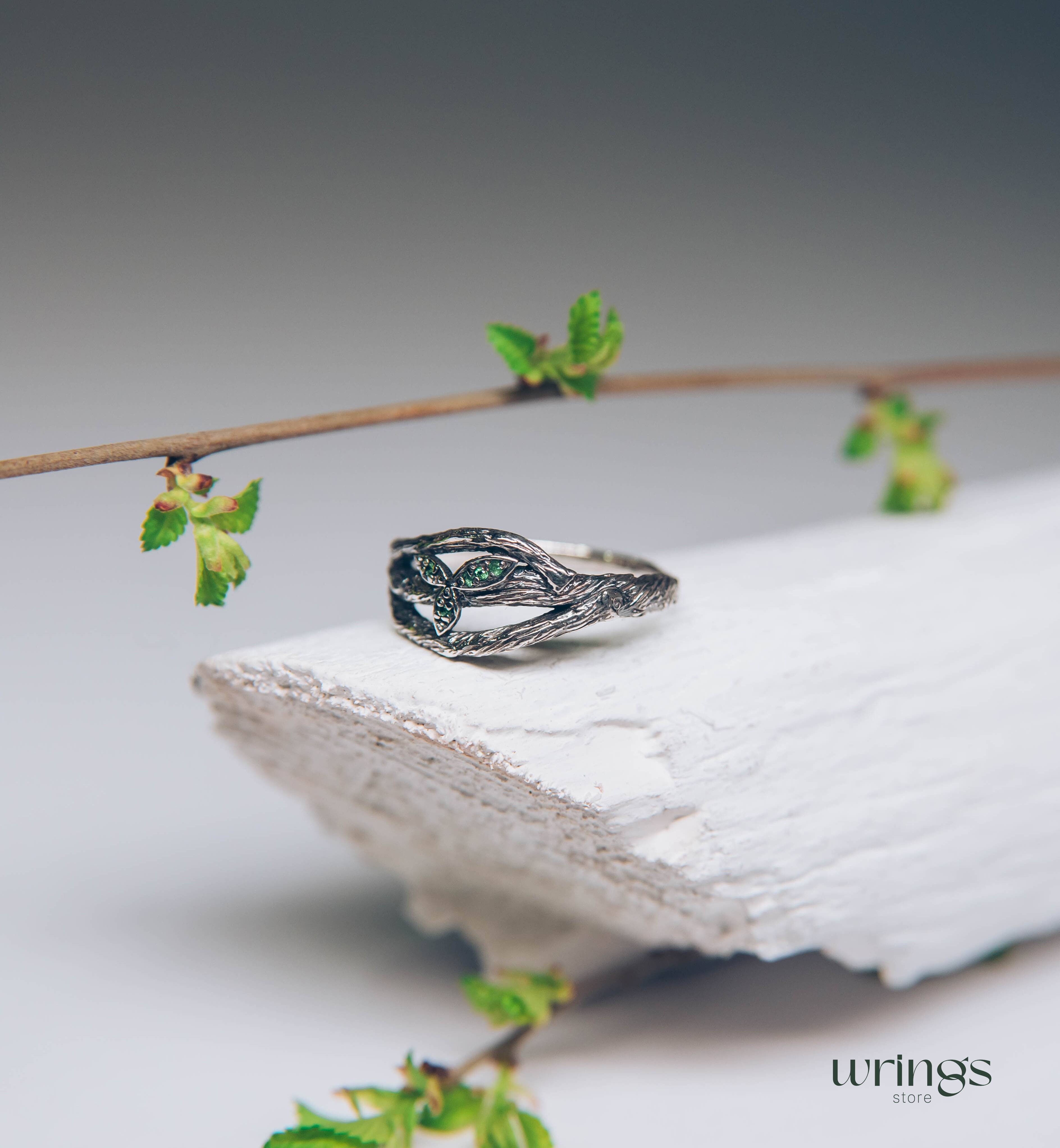 Subtle Silver Twisted Branch Unique Emerald Ring with Leaves