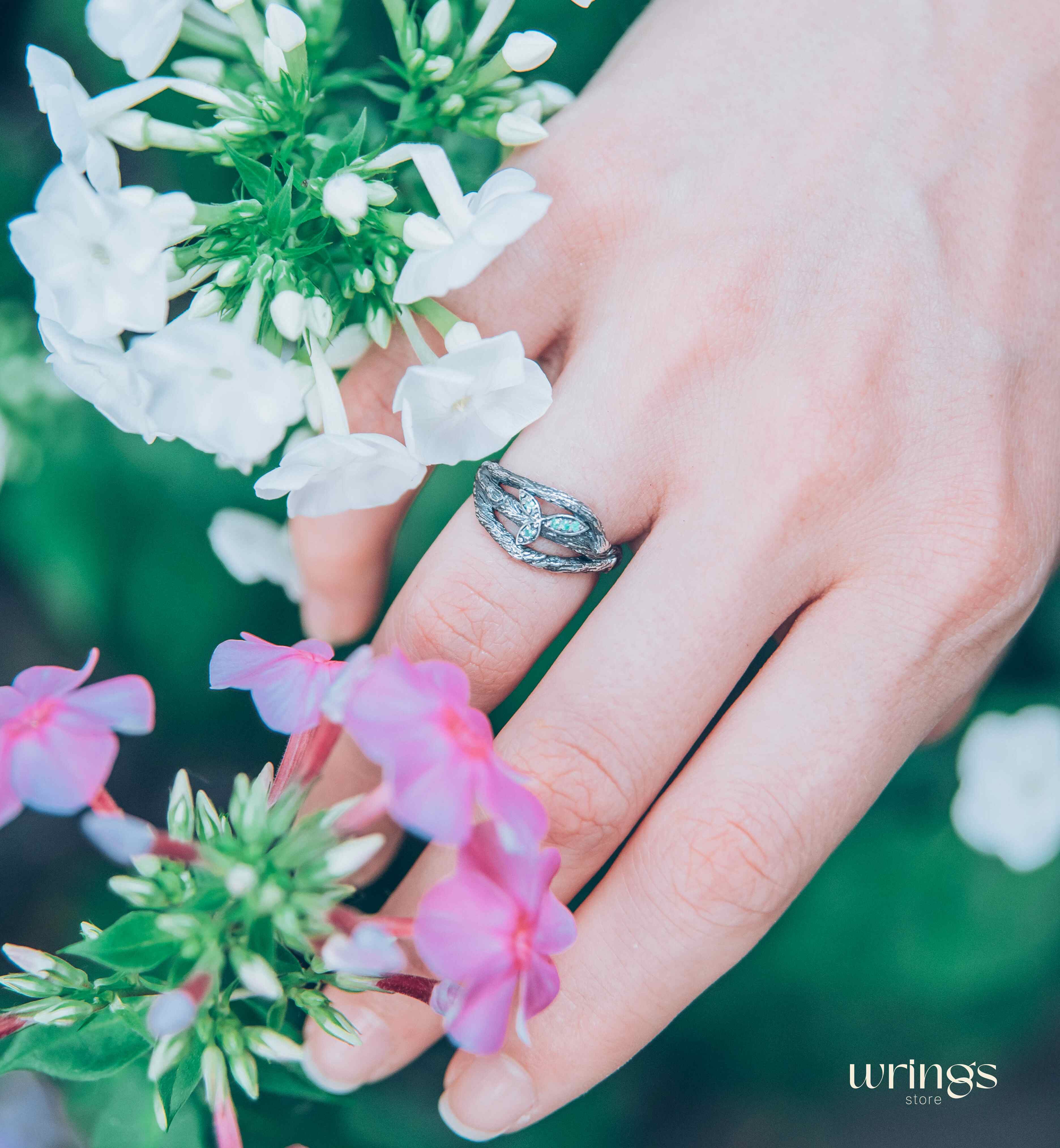 Subtle Silver Twisted Branch Unique Emerald Ring with Leaves