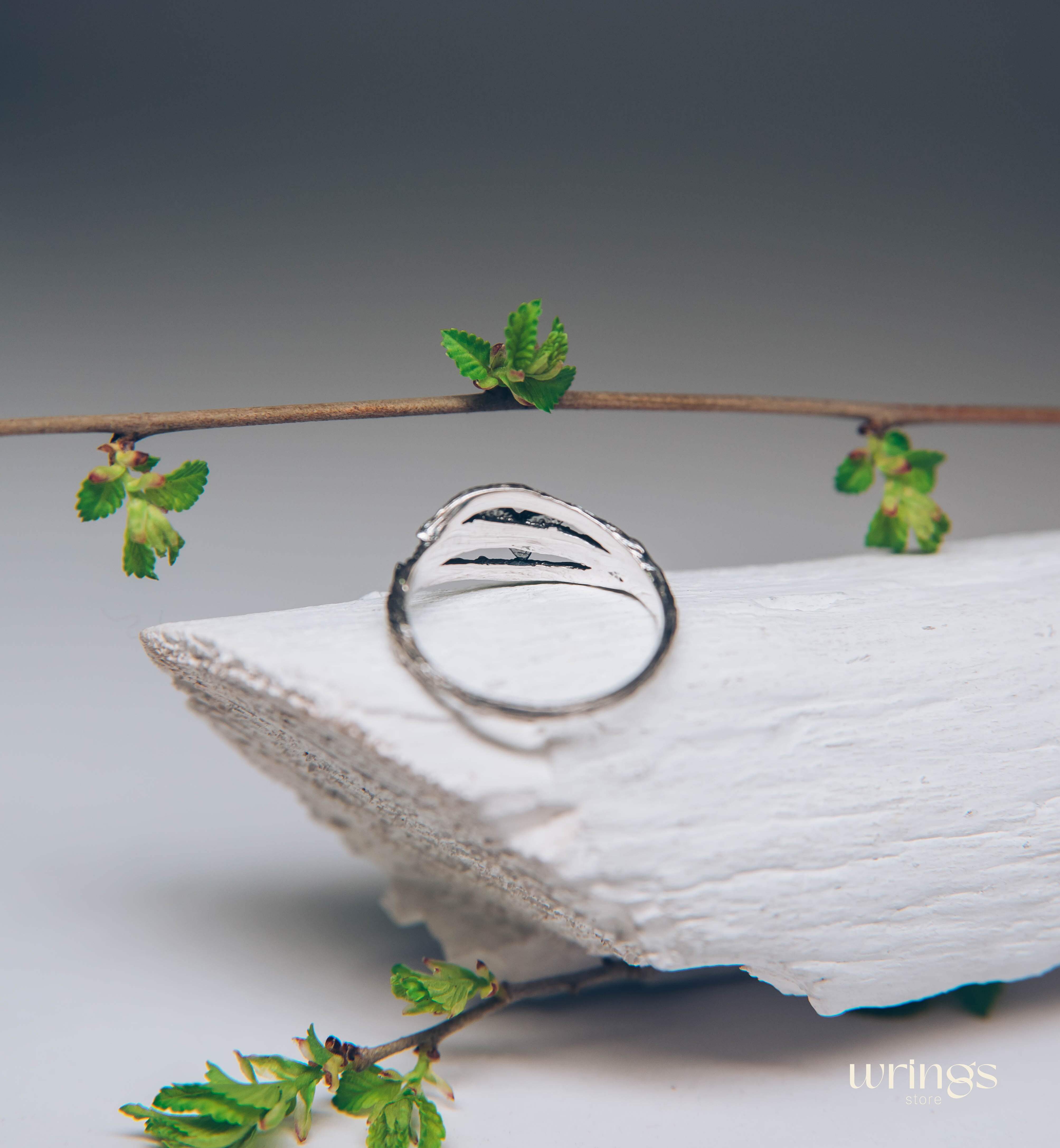 Subtle Silver Twisted Branch Unique Emerald Ring with Leaves