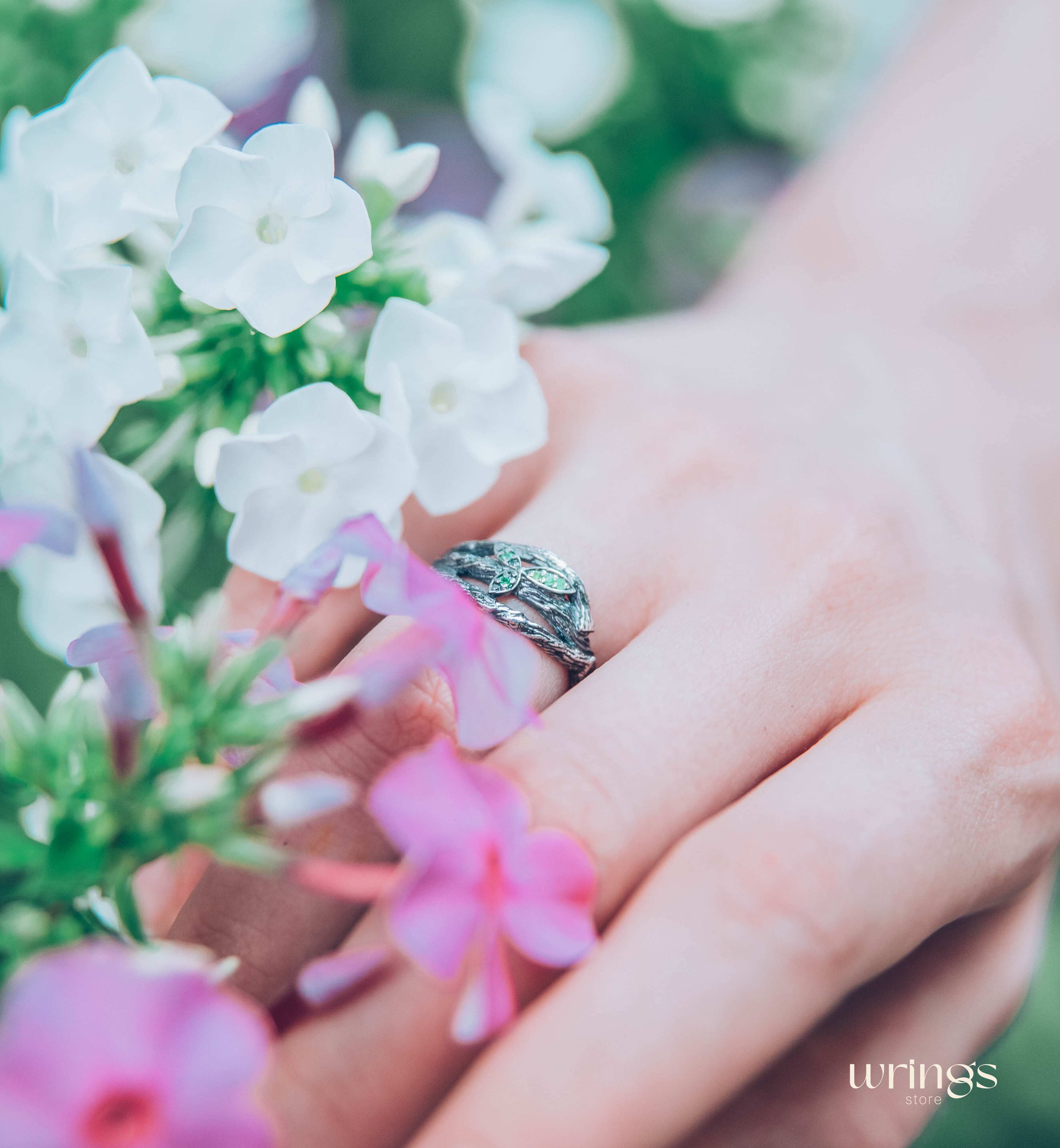 Subtle Silver Twisted Branch Unique Emerald Ring with Leaves