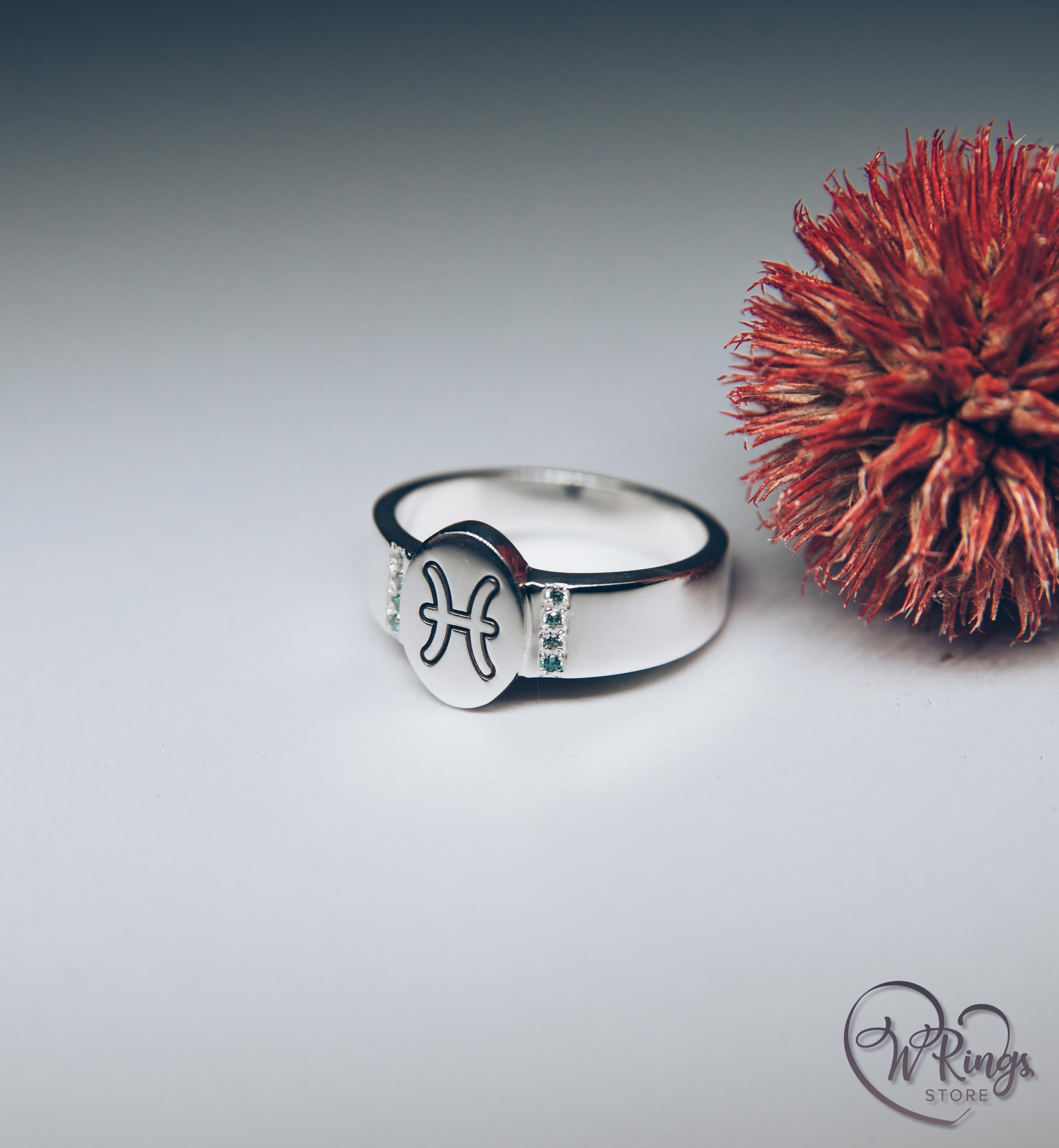 Oval shape Pisces Signet Ring & Side Topazes