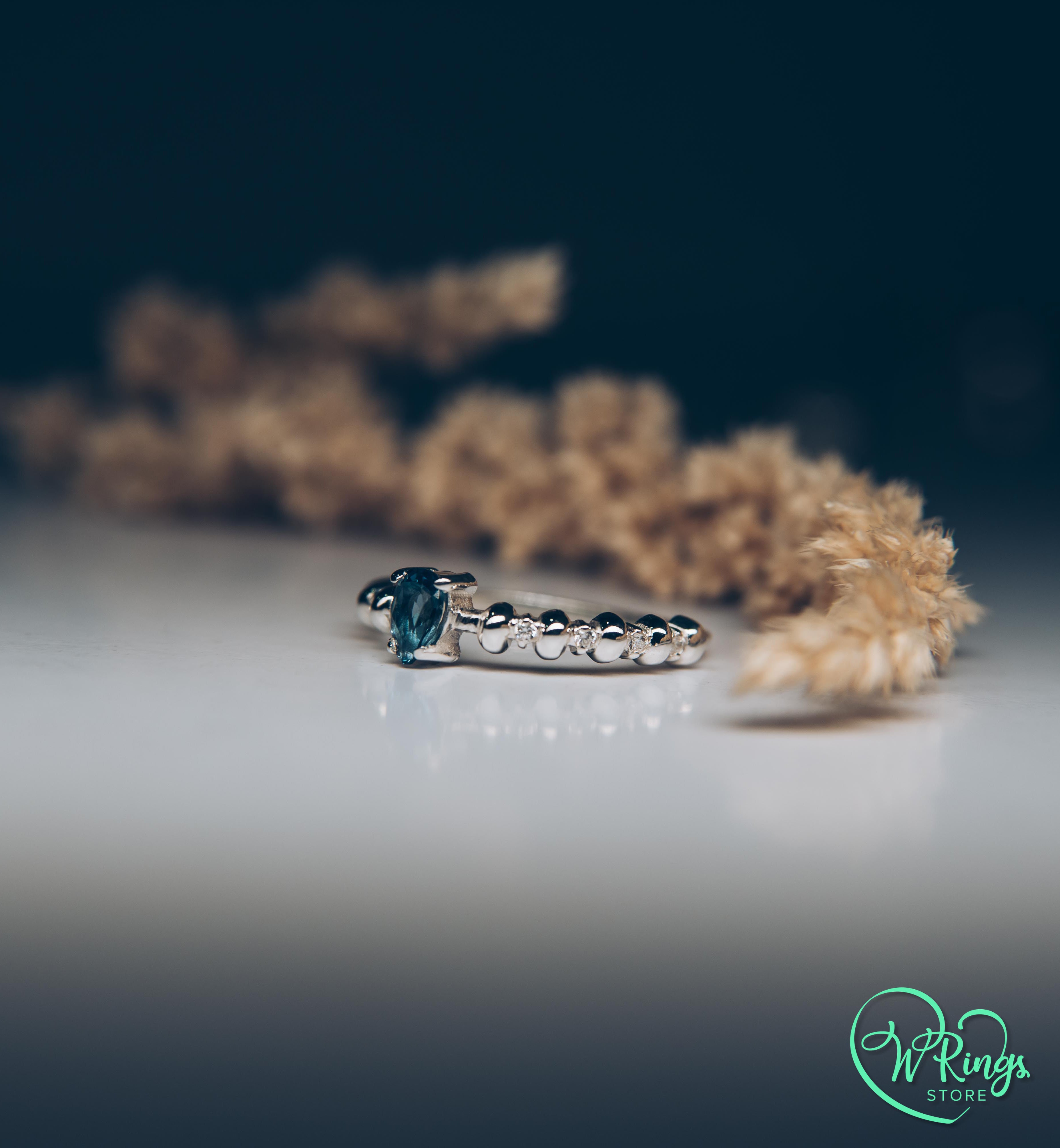 Pear London Blue Topaz Engagement Ring in Silver with Accent Stones