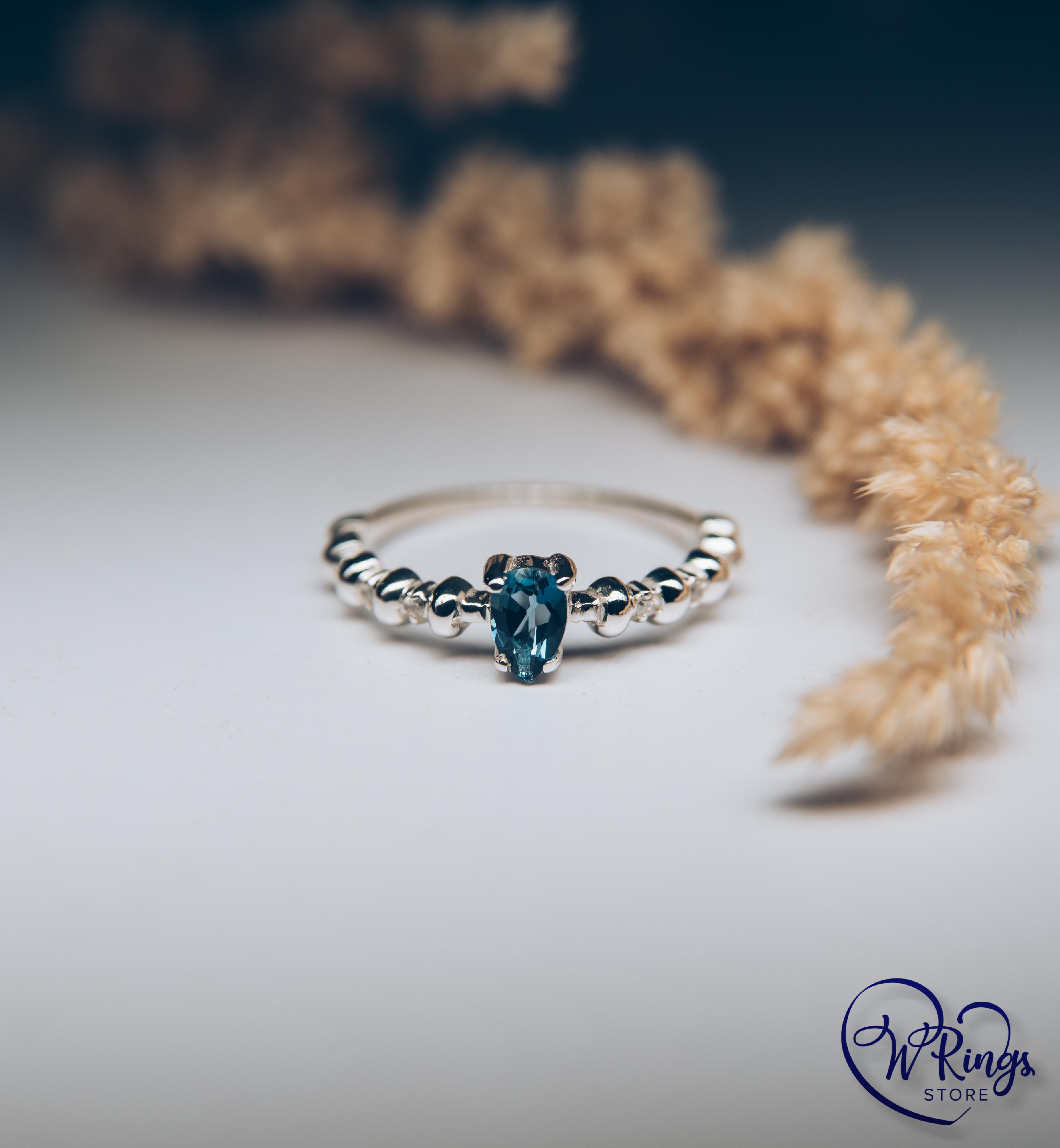 Pear London Blue Topaz Engagement Ring in Silver with Accent Stones