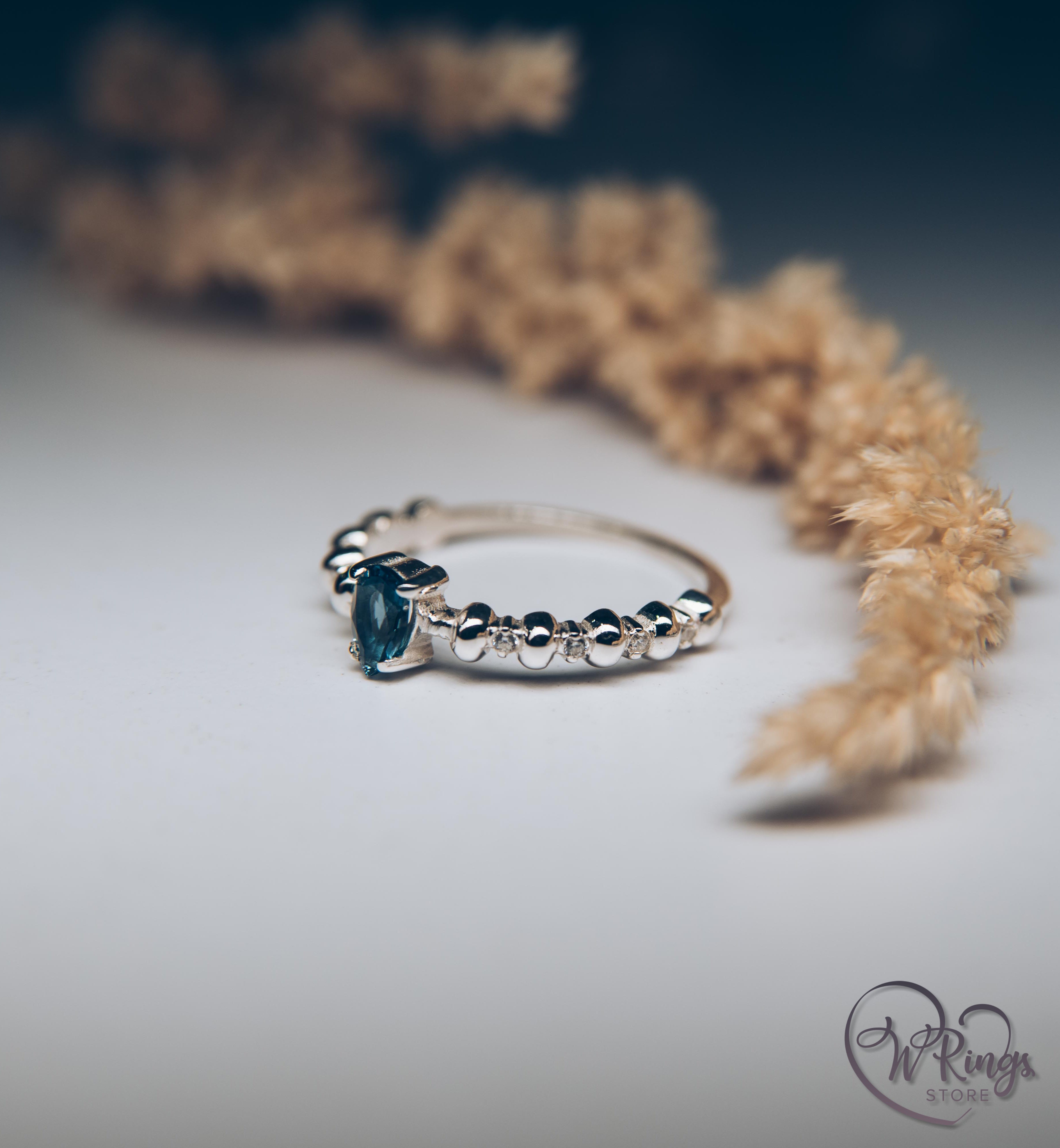 Pear London Blue Topaz Engagement Ring in Silver with Accent Stones