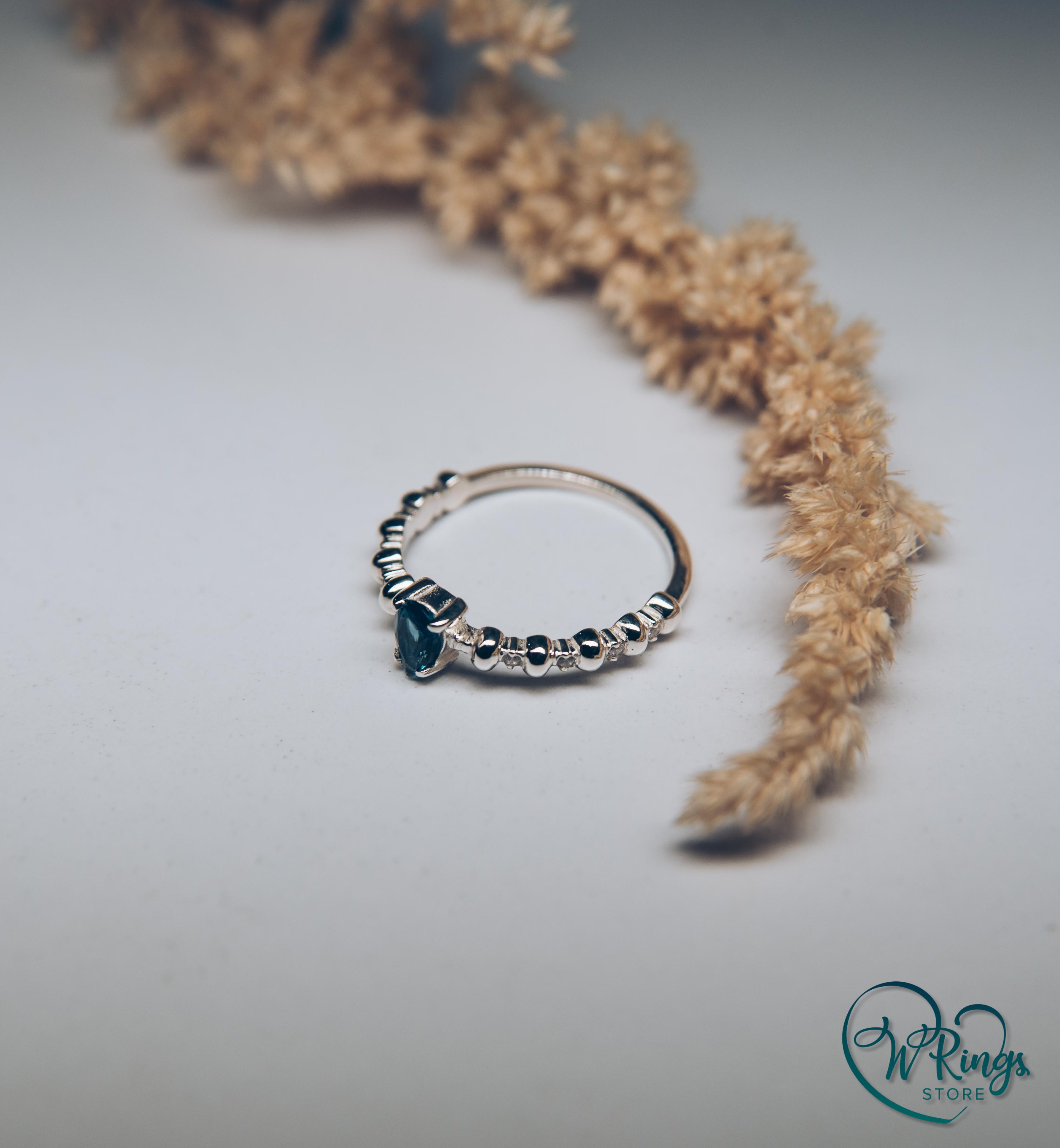 Pear London Blue Topaz Engagement Ring in Silver with Accent Stones