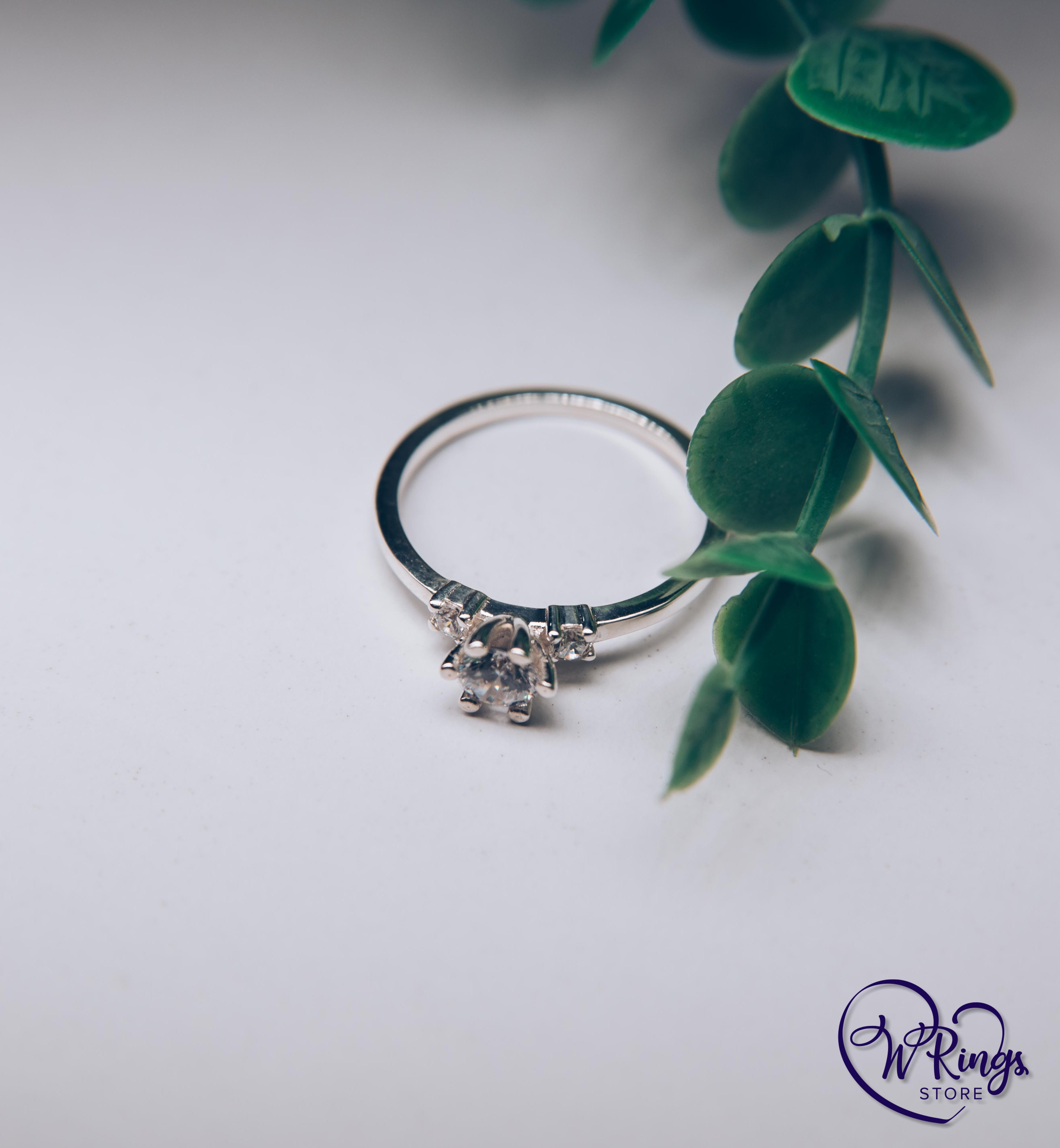 Round CZ Three Stone Engagement Ring in Silver