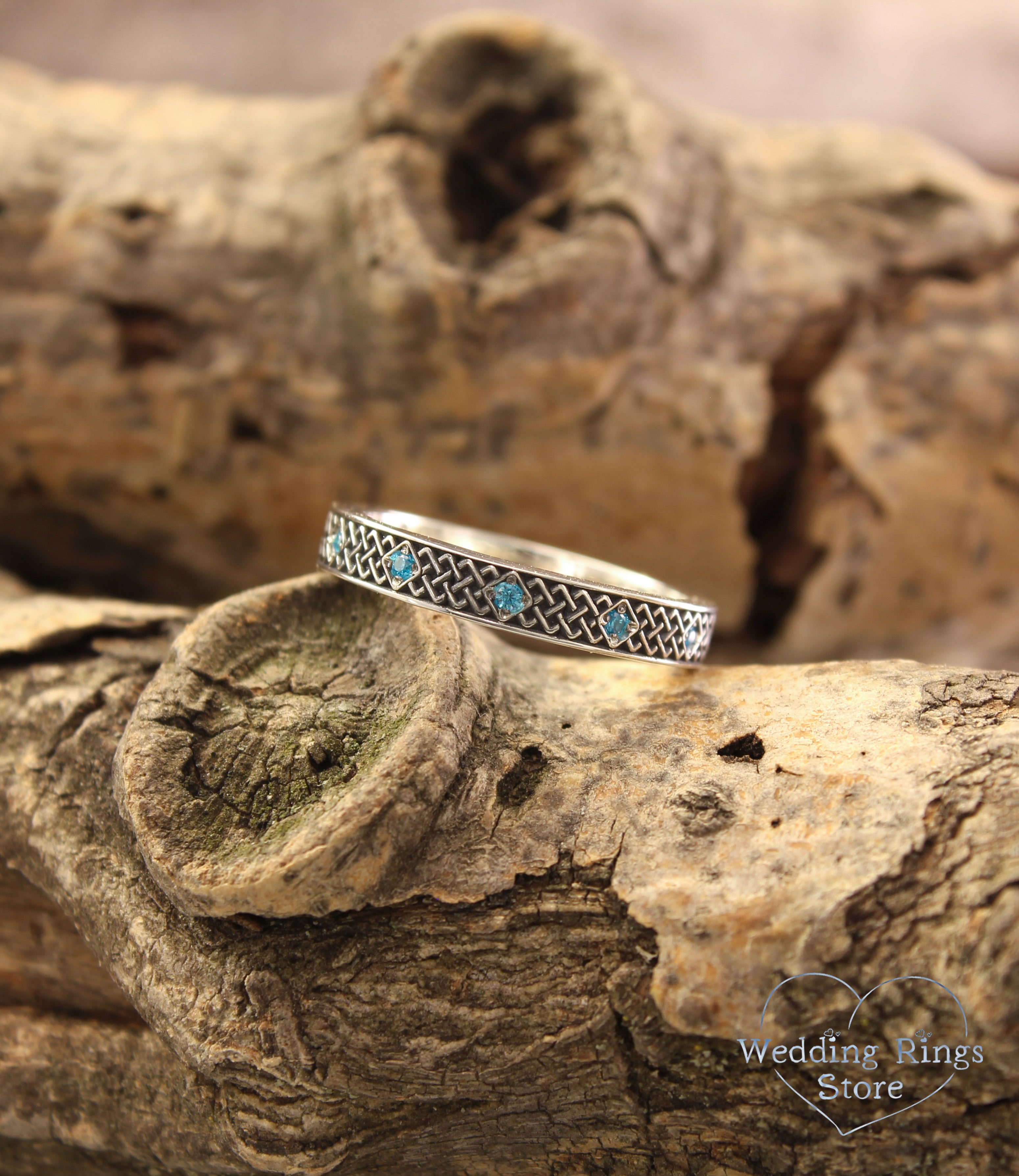 Silver Celtic Wedding Ring for Her – Subtle Knots & Blue Topazes