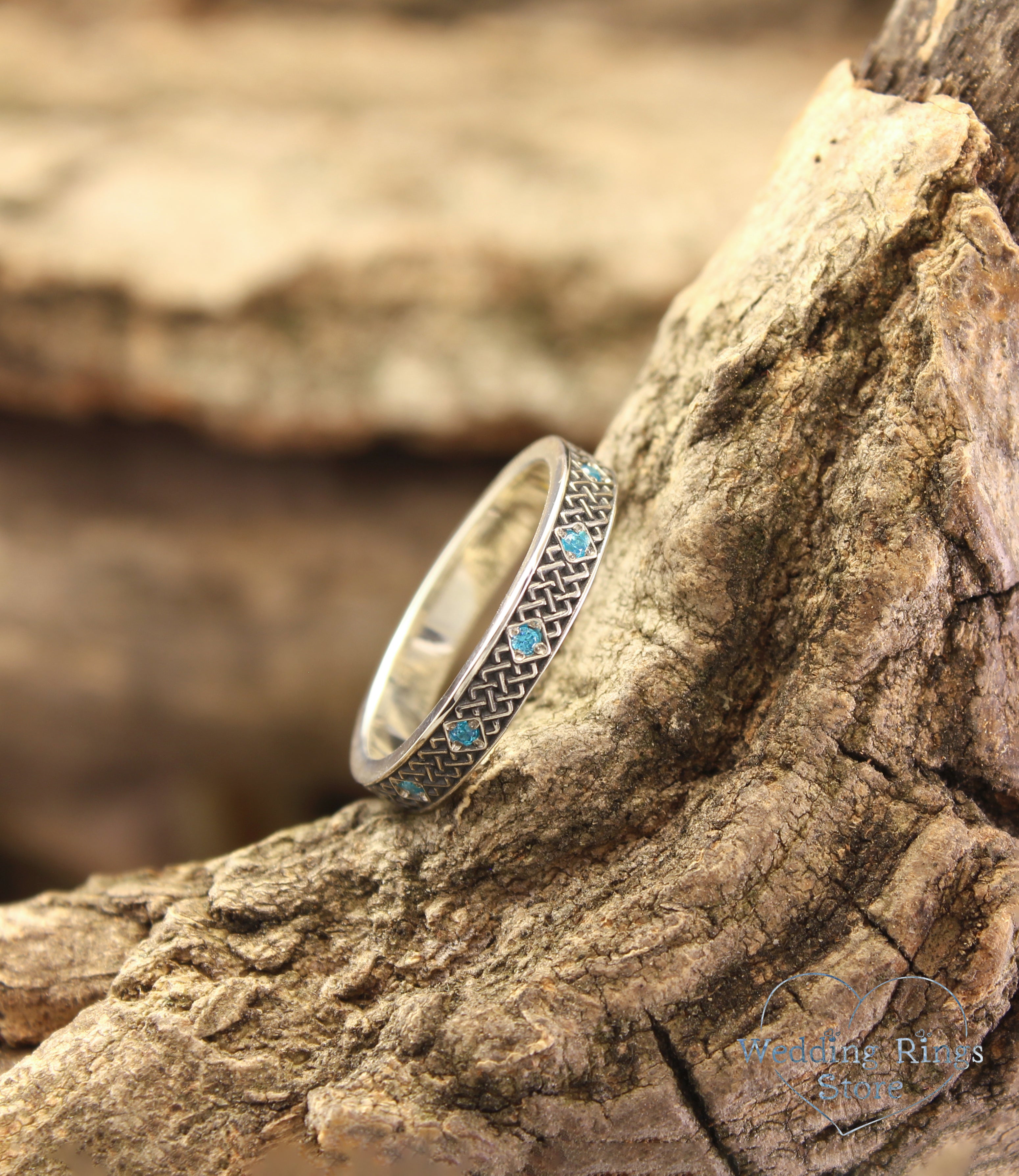 Silver Celtic Wedding Ring for Her – Subtle Knots & Blue Topazes