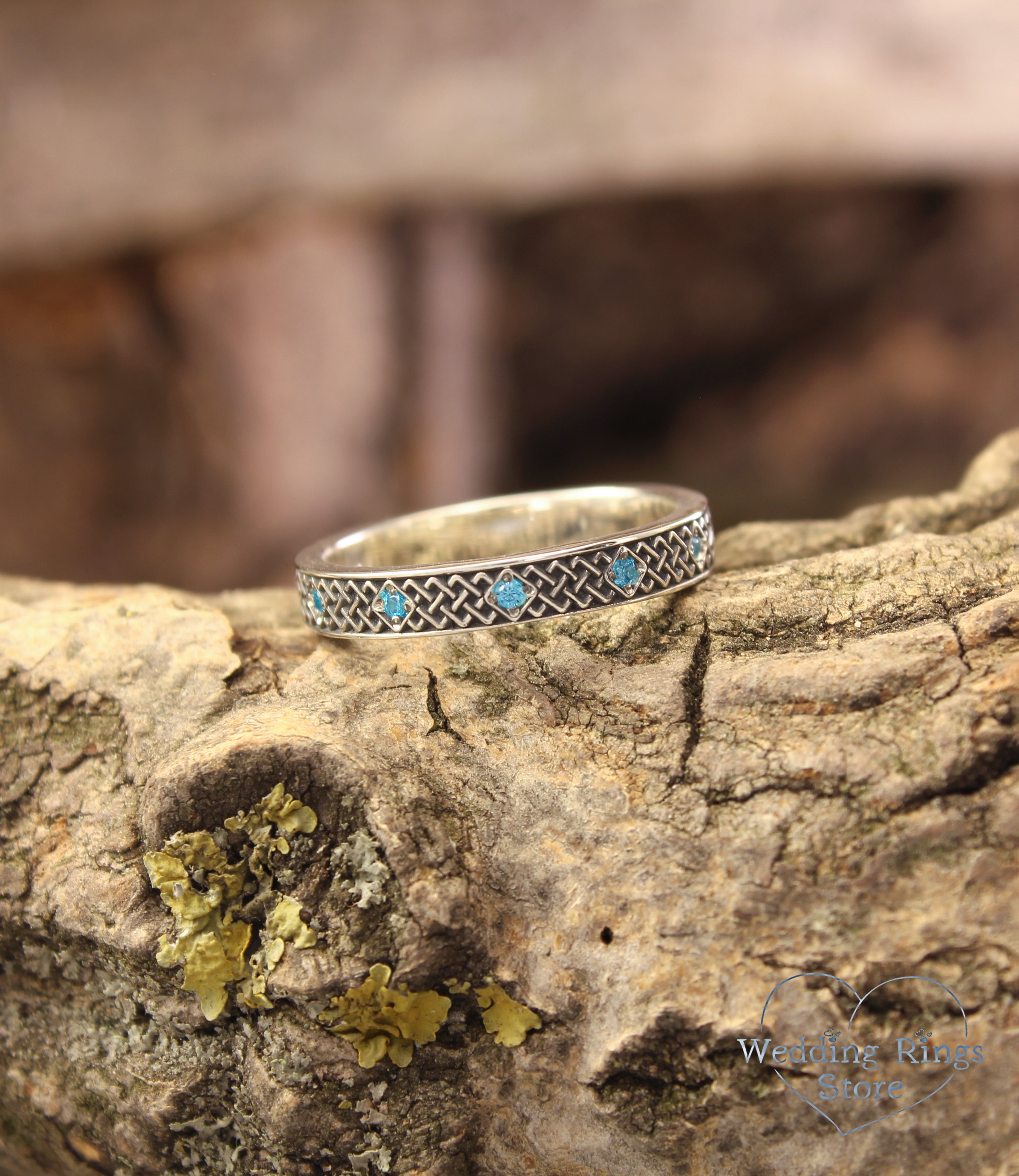 Silver Celtic Wedding Ring for Her – Subtle Knots & Blue Topazes