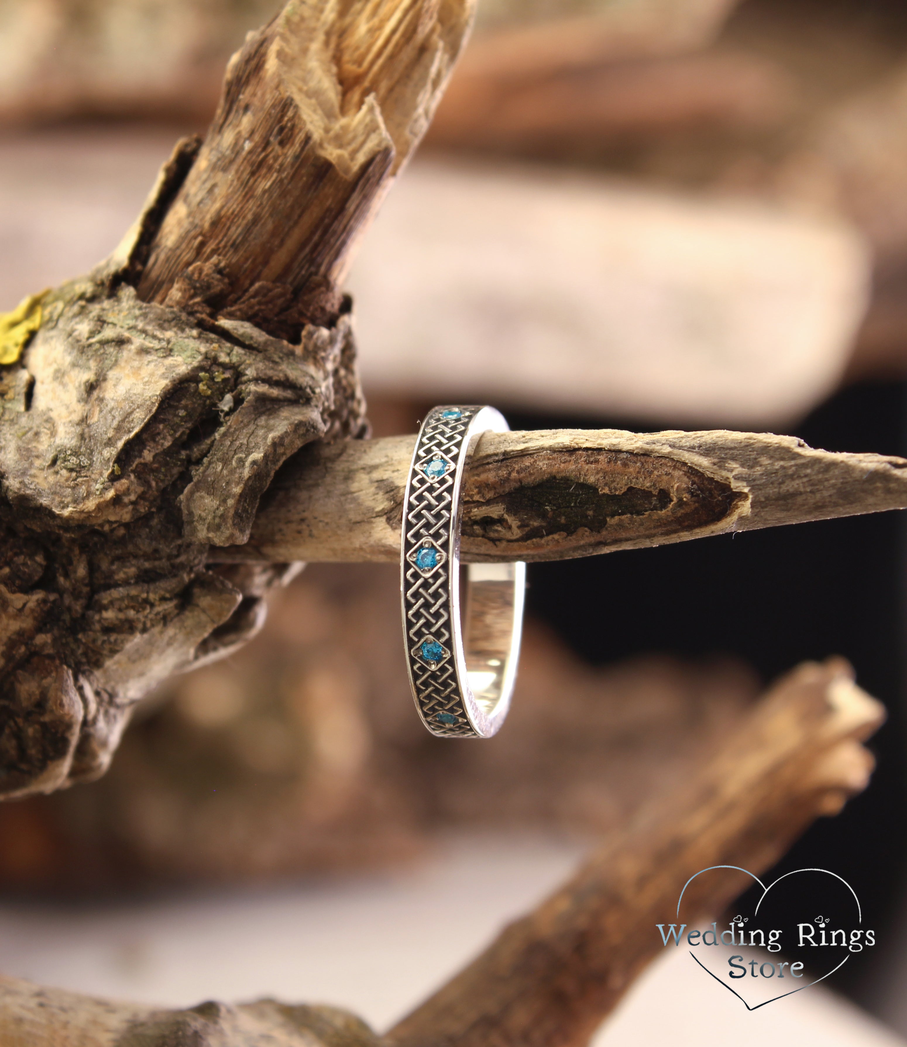 Silver Celtic Wedding Ring for Her – Subtle Knots & Blue Topazes