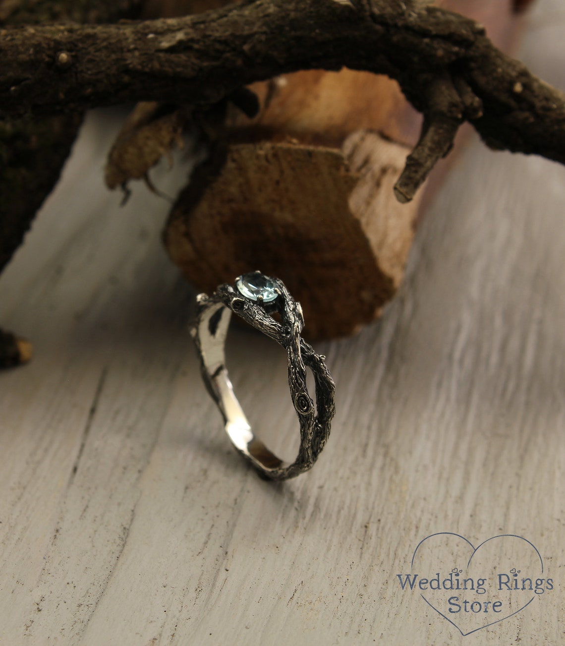 Sparkling Oval Topaz Braided Silver Branch Engagement Ring