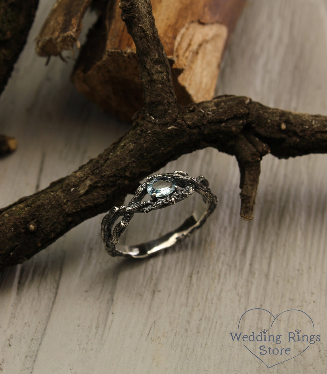 Sparkling Oval Topaz Braided Silver Branch Engagement Ring