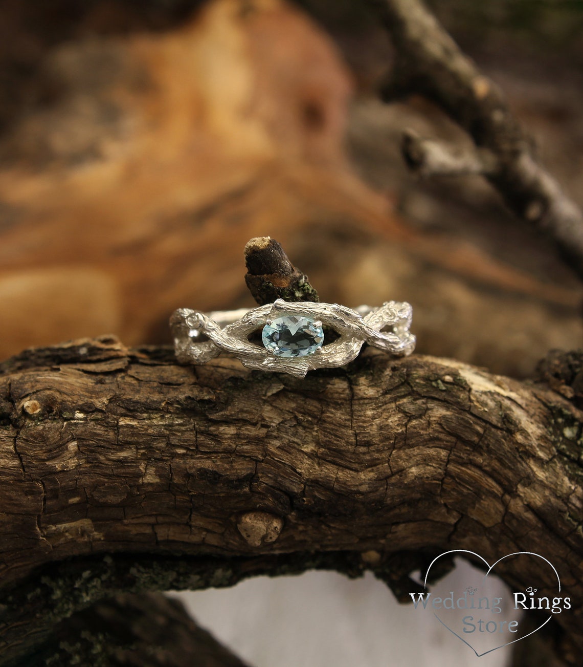 Sparkling Oval Topaz Braided Silver Branch Engagement Ring