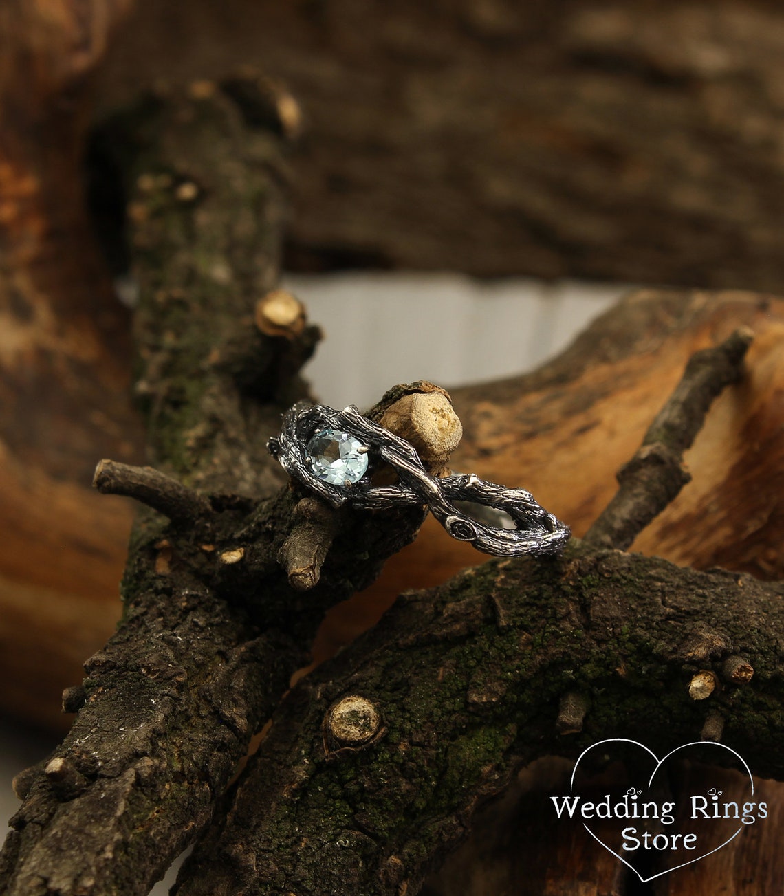 Sparkling Oval Topaz Braided Silver Branch Engagement Ring