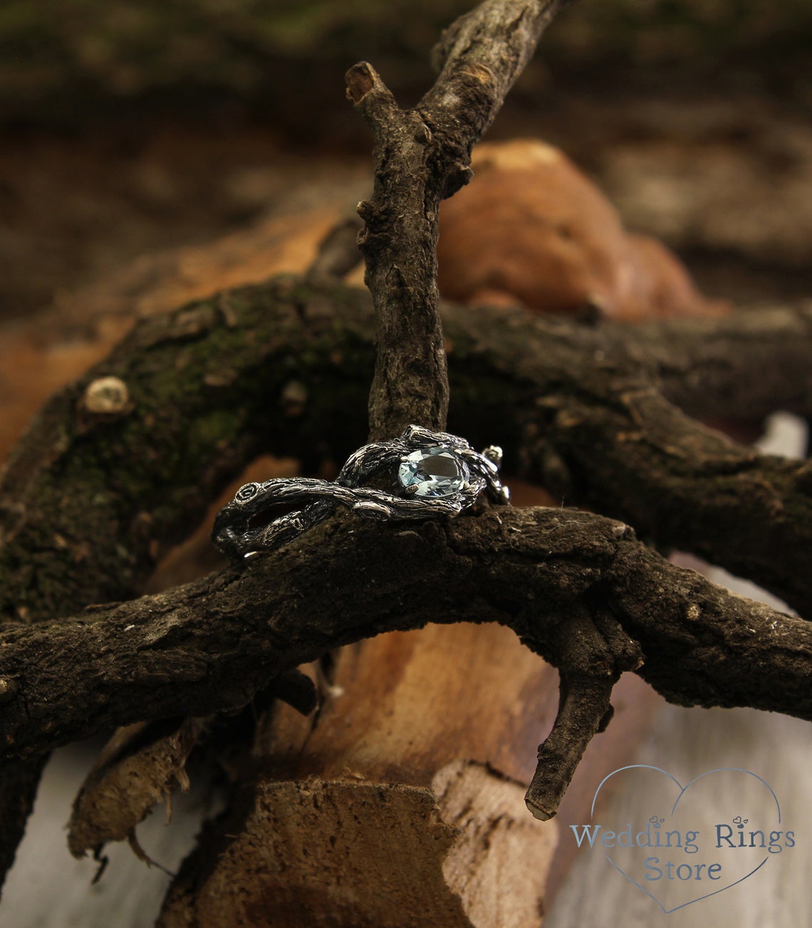Sparkling Oval Topaz Braided Silver Branch Engagement Ring