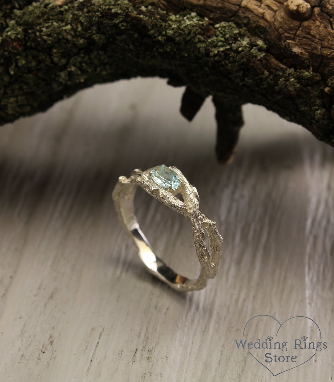 Sparkling Oval Topaz Braided Silver Branch Engagement Ring