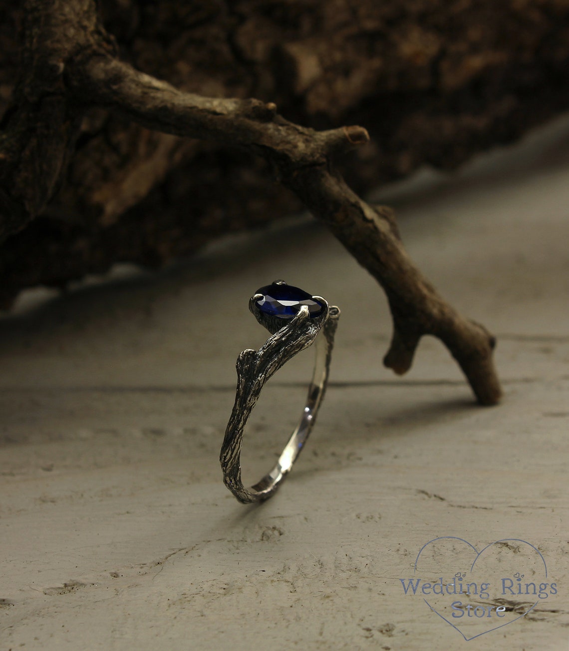 Pear cut Sapphire joins Silver Branches Engagement Ring