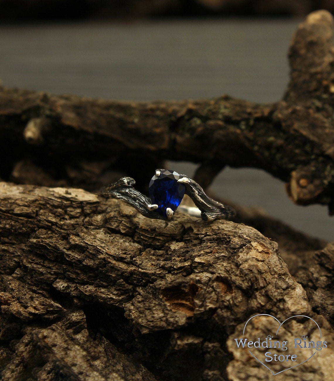 Pear cut Sapphire joins Silver Branches Engagement Ring