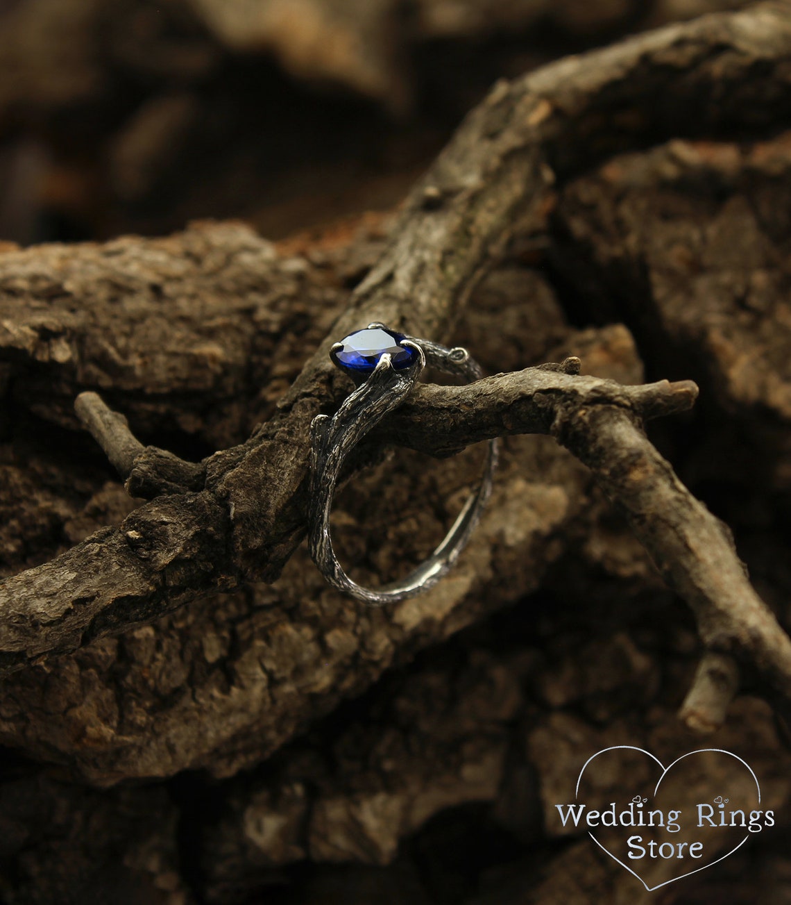 Pear cut Sapphire joins Silver Branches Engagement Ring