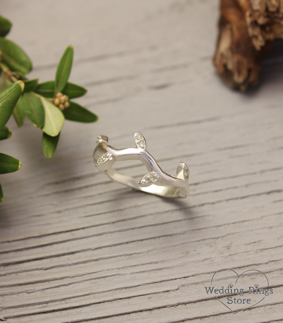 Thin Wave Twig Ring with Delicate Leaves of Natural Peridot