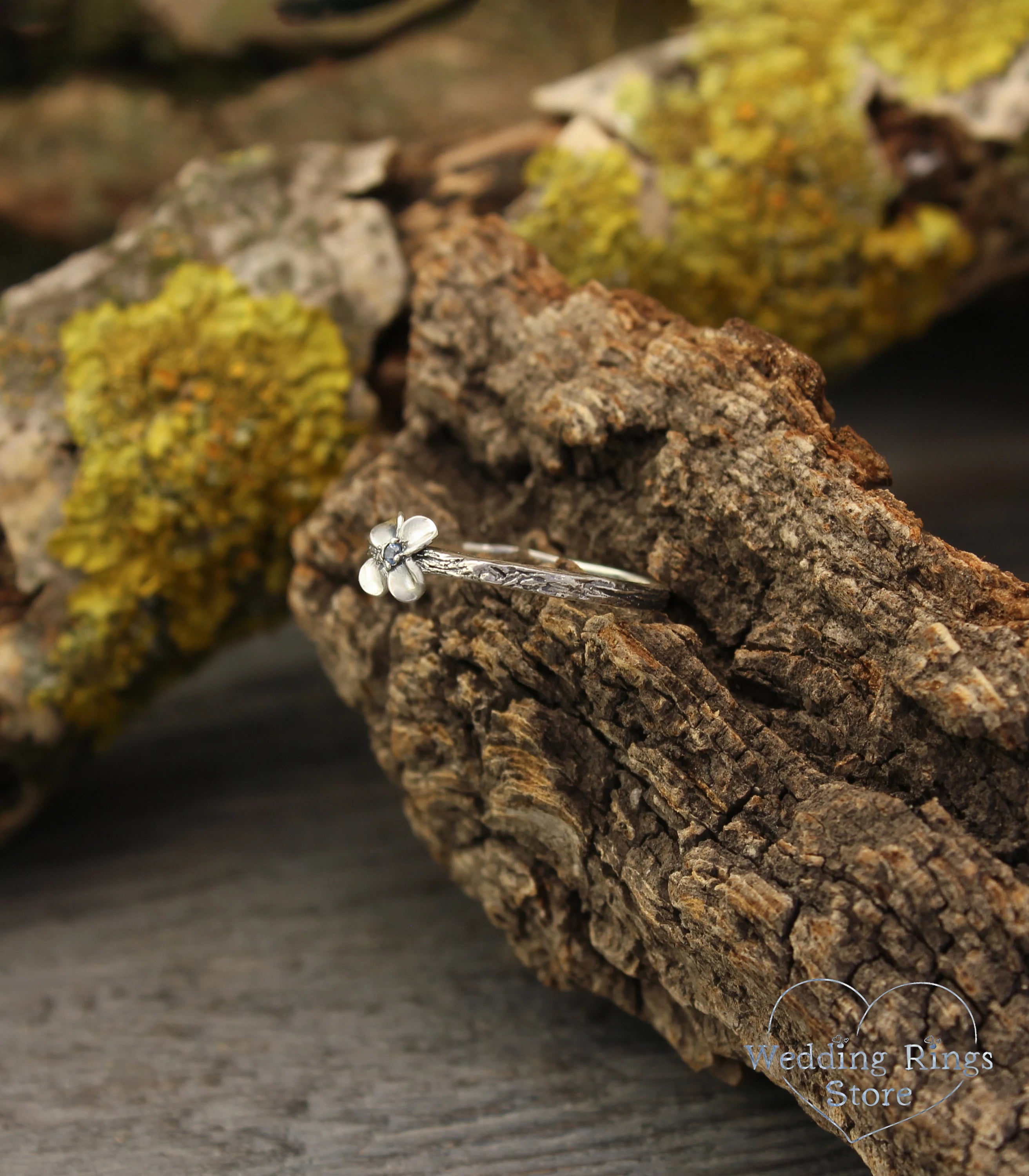 Dainty Flower Ring with Swiss Topaz on tiny Silver Branch