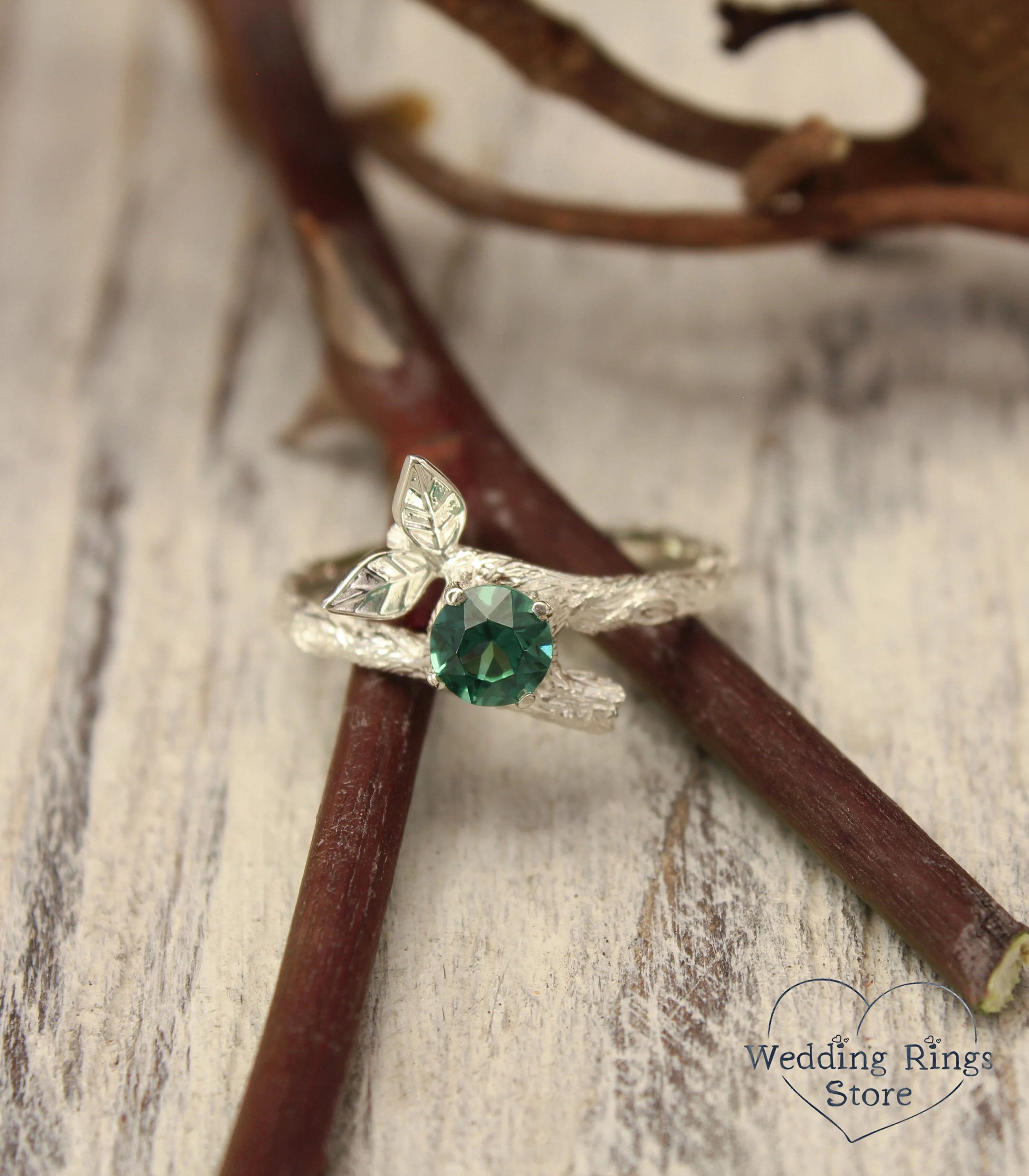 Emerald with Two Silver Twigs & Leaf Ring