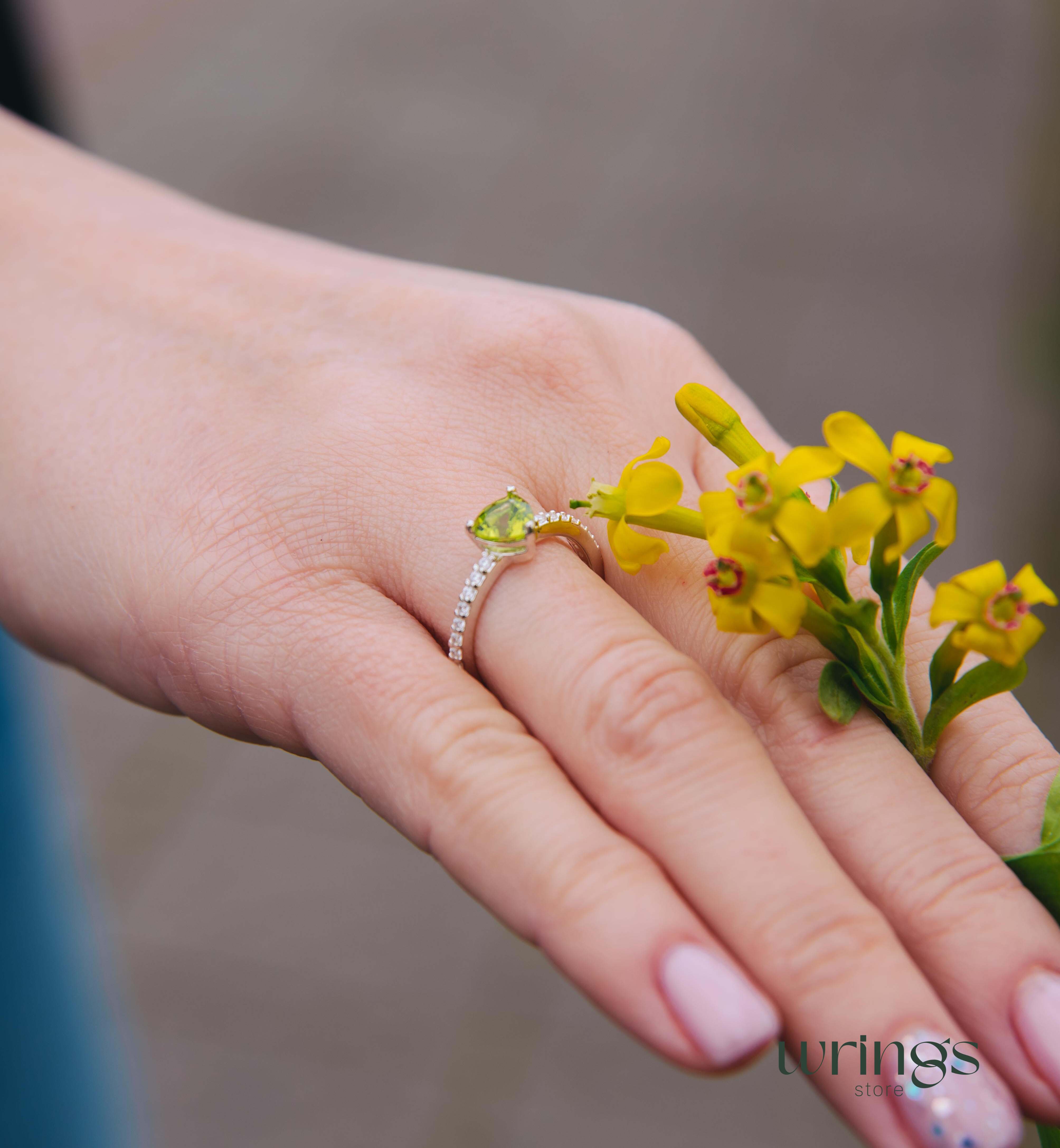 Trilliant Peridot Engagement Ring & CZ Side Stones