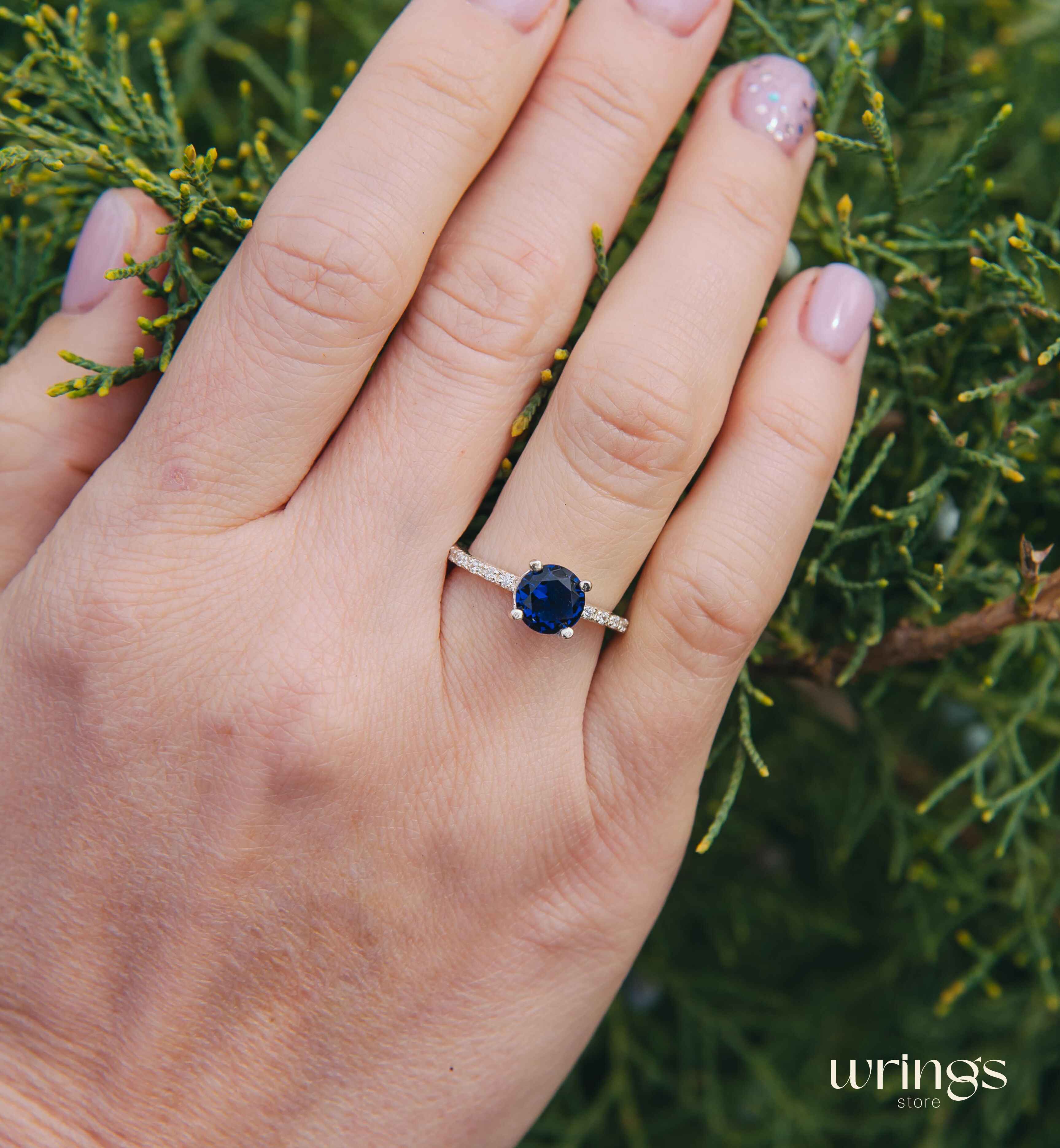 Large Simulated Sapphire Engagement Ring with Side Stones