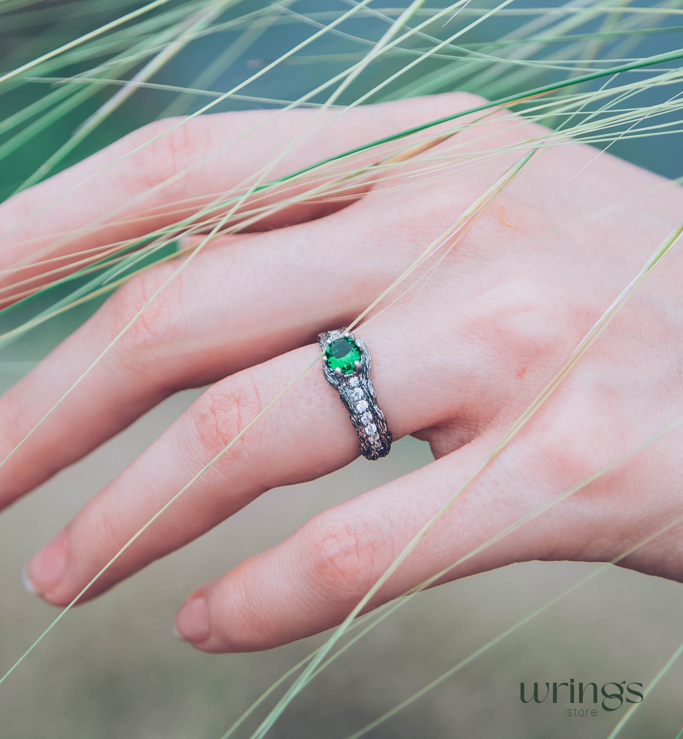 Gorgeous Emerald Ring with multiple Accent Stones