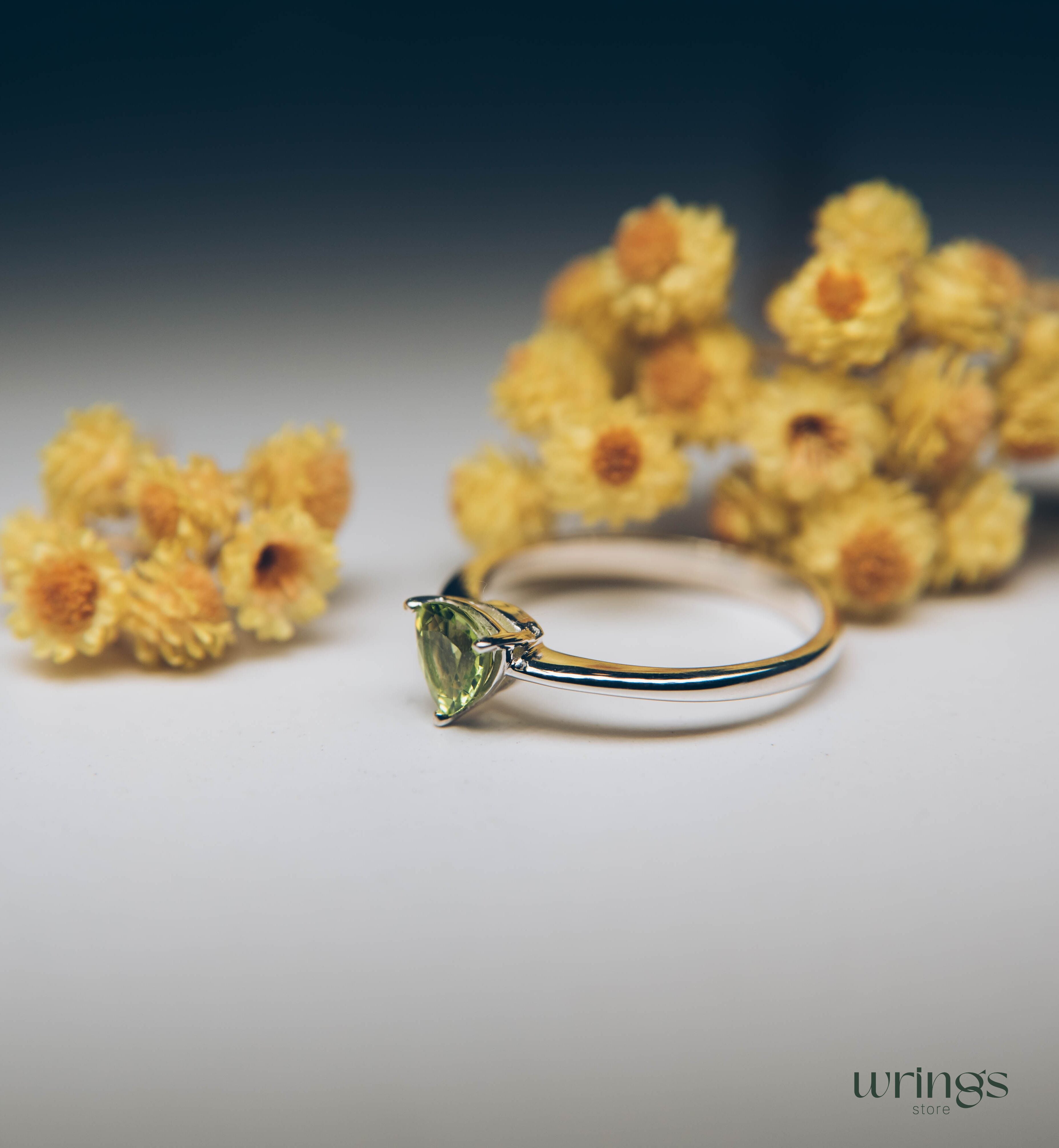 Classic Trilliant Solitaire Peridot Engagement Ring Silver