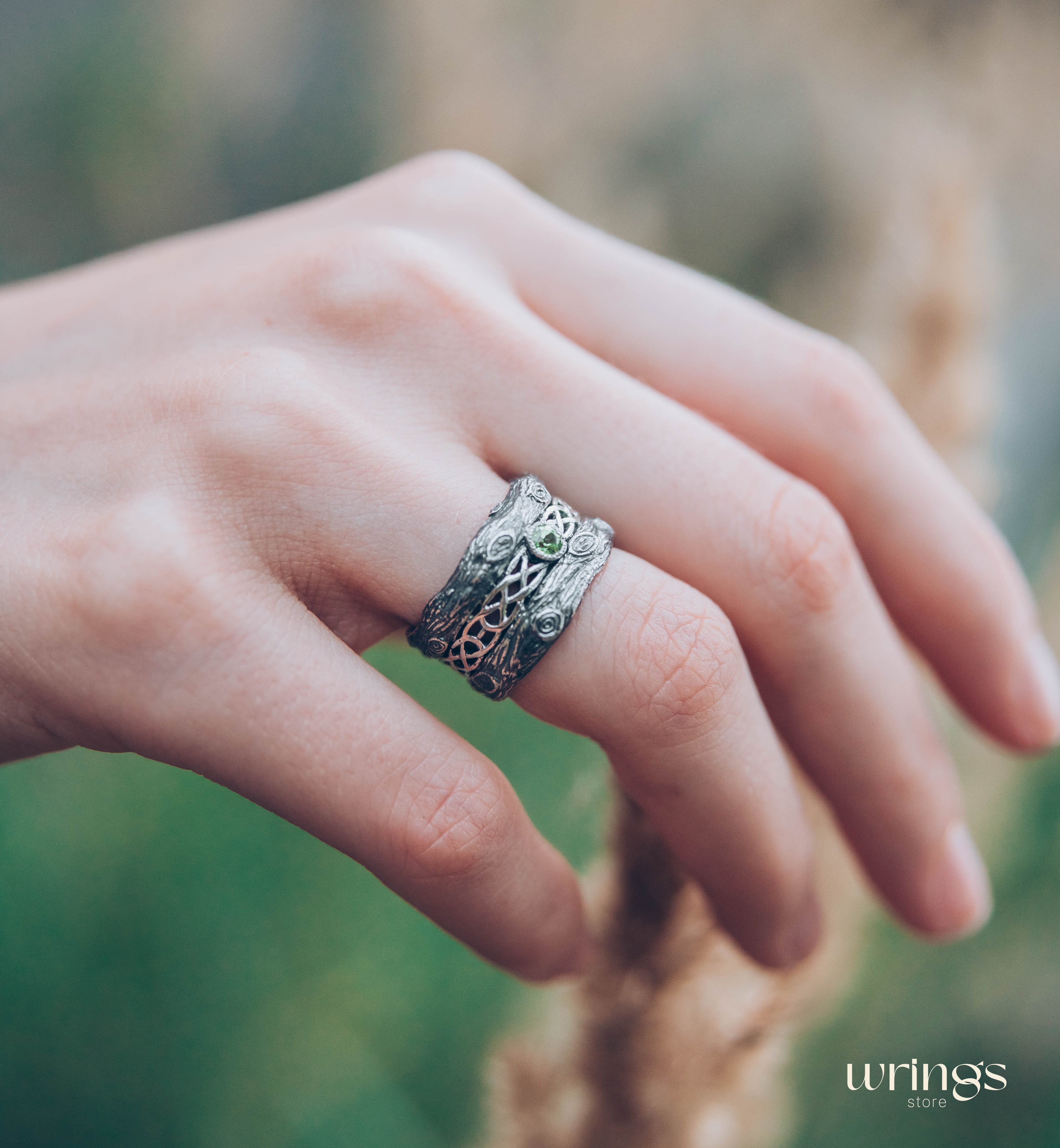 Silver bark with Celtic Weaves & Peridot Wedding Ring