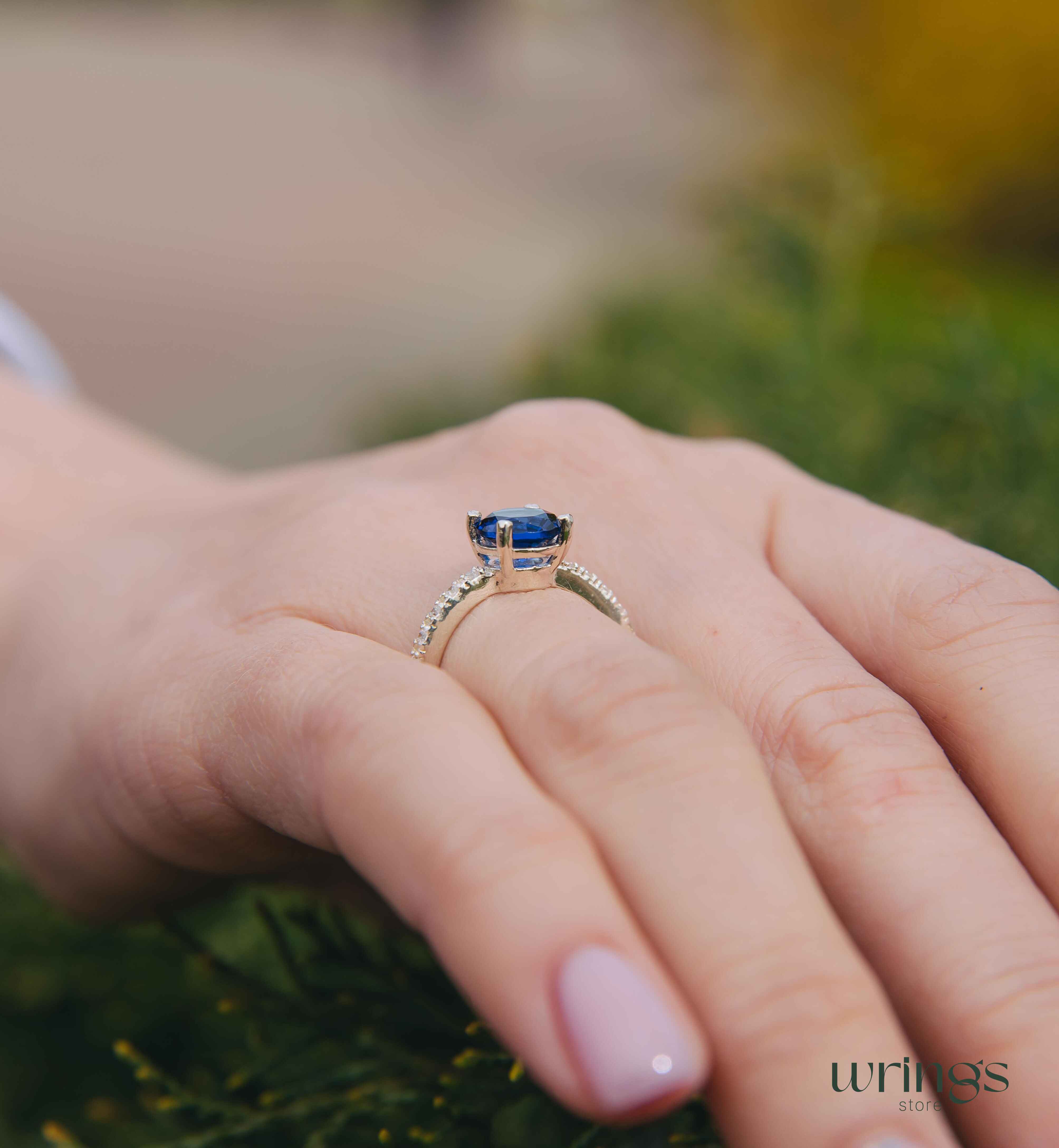 Large Simulated Sapphire Engagement Ring with Side Stones