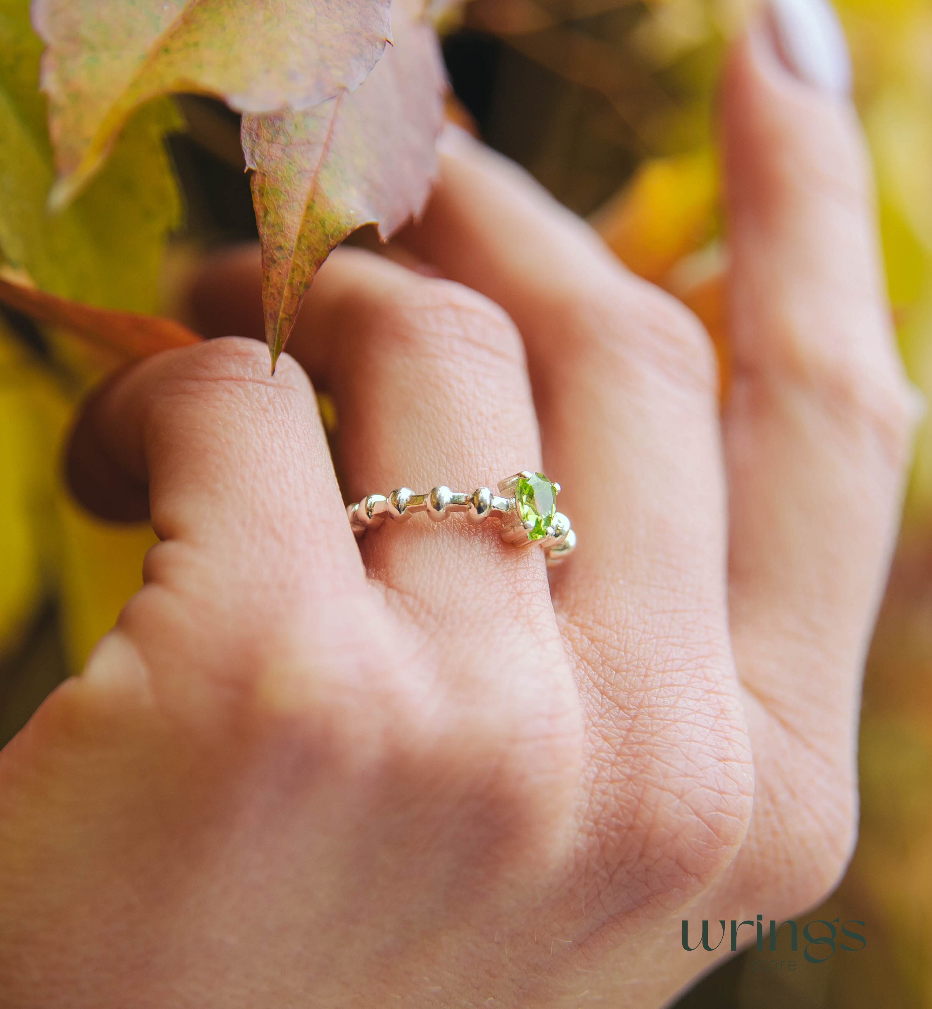 Pear shape Peridot Engagement Ring Silver Beaded Band