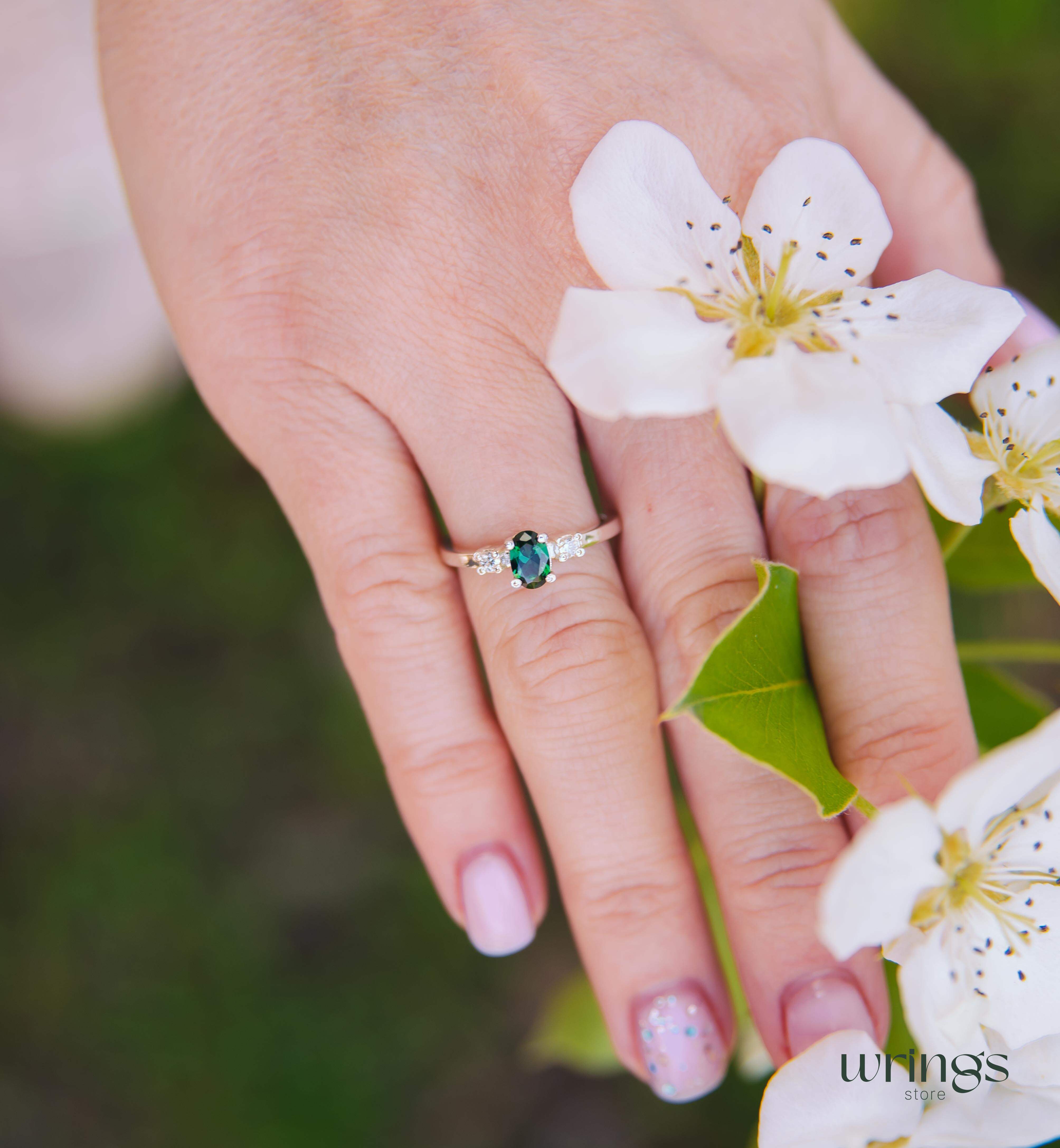 Vertical Oval LG Green Tourmaline Ring & Side Stones