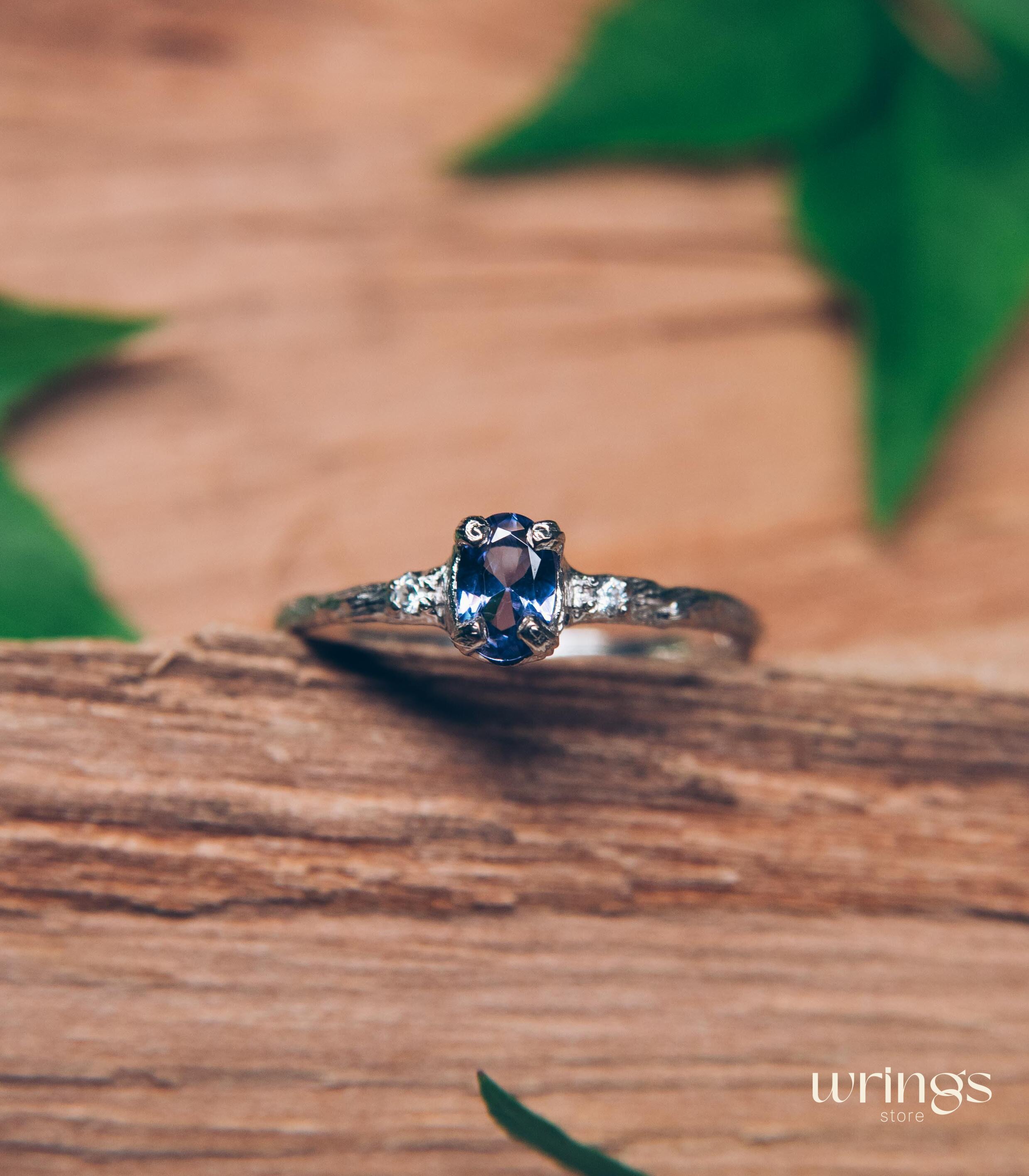 Tanzanite in Small Silver Twig Ring & CZ Side Stones