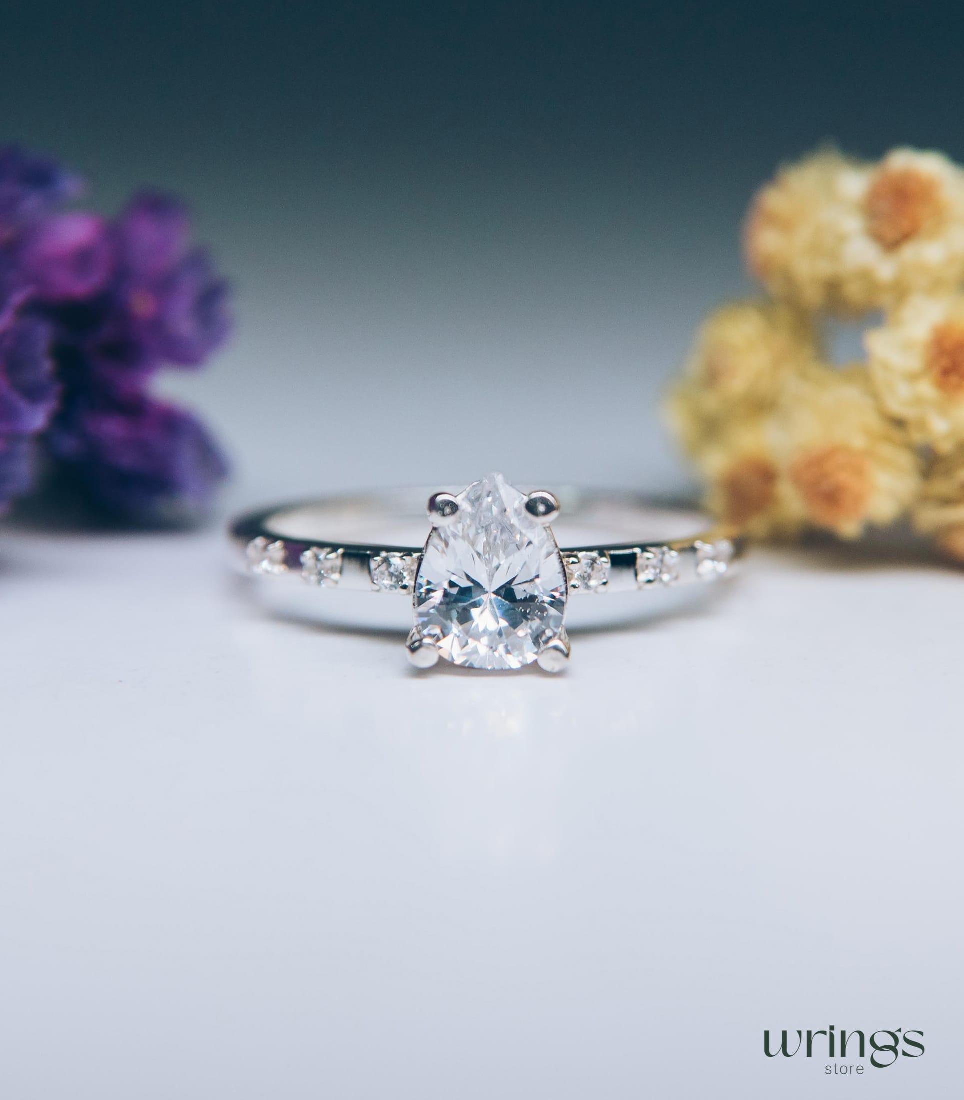Large Pear Diamond CZ Engagement Ring with Side Stones