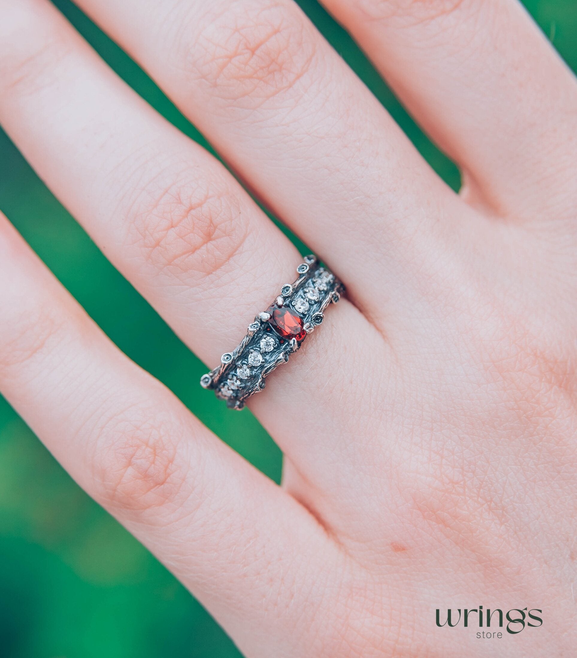 Knot and Branch Garnet Engagement Ring with Side Stones