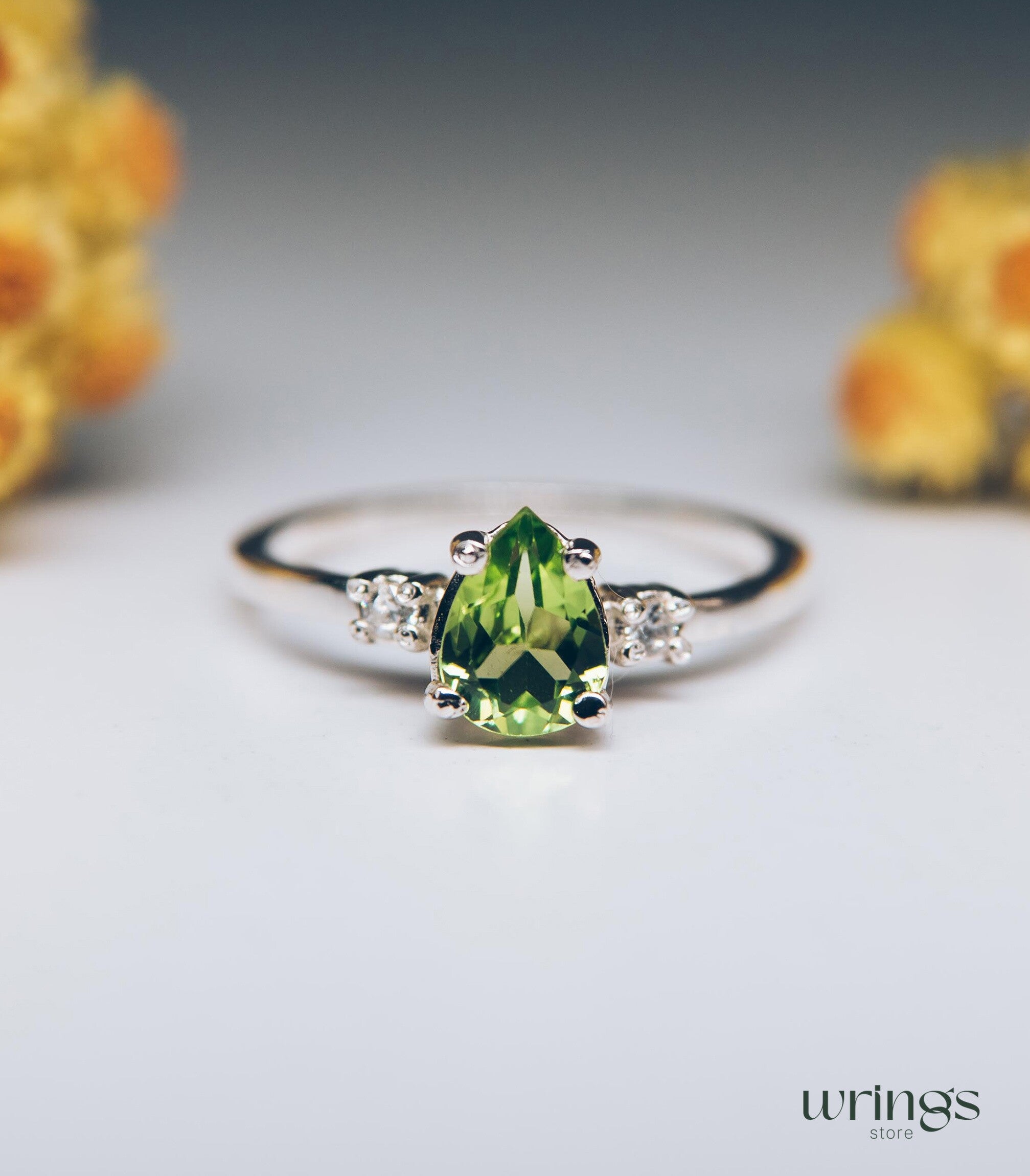 Large Pear Peridot Three Stone Engagement Ring Silver