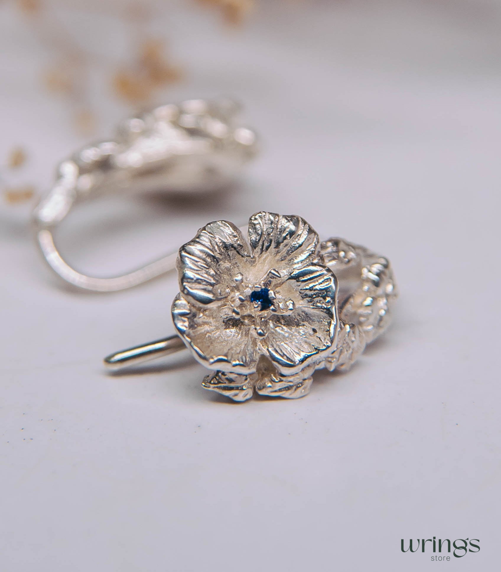 Silver Poppy Flower Earrings with Blue Sapphire